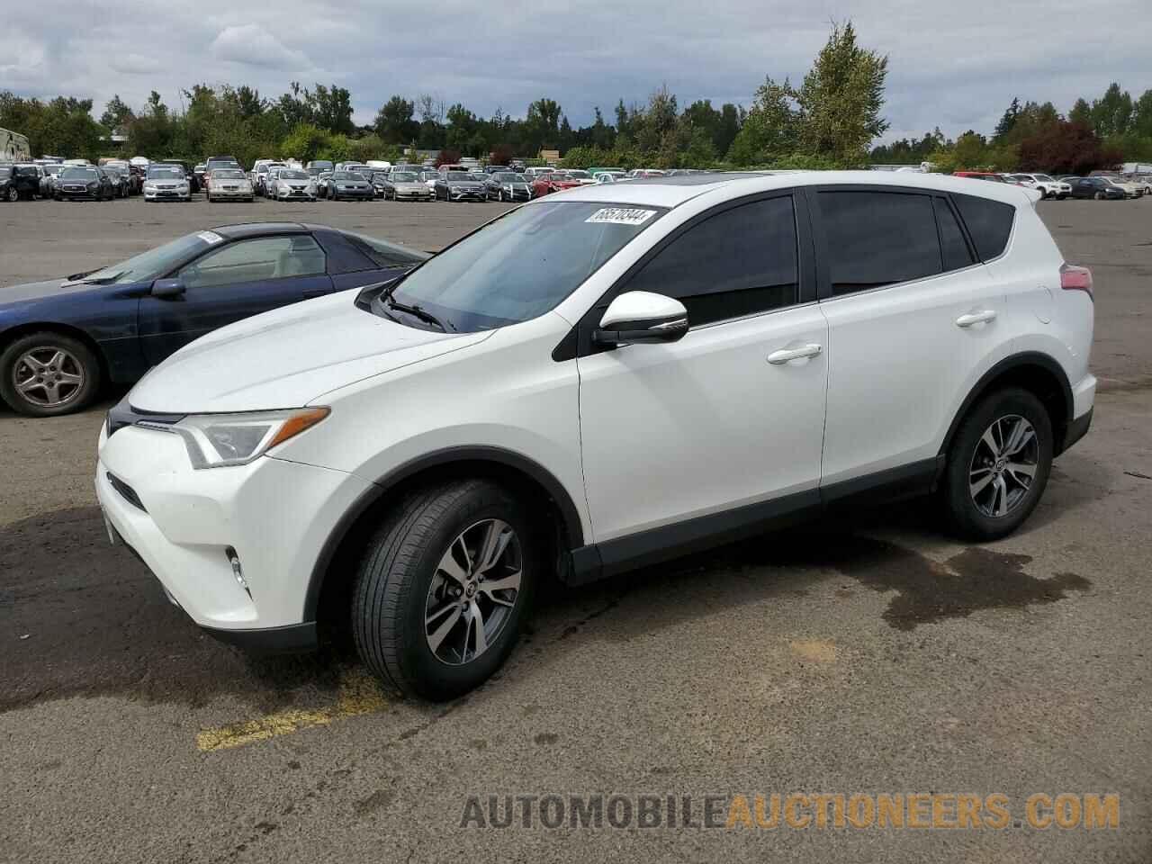 2T3RFREV3JW759057 TOYOTA RAV4 2018