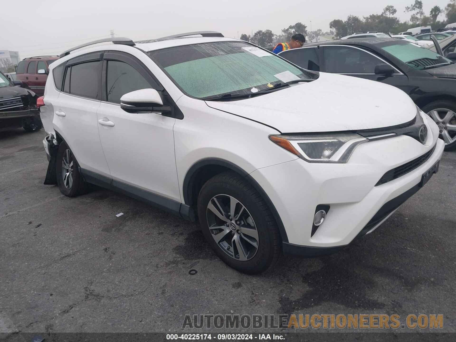 2T3WFREV0JW460385 TOYOTA RAV4 2018