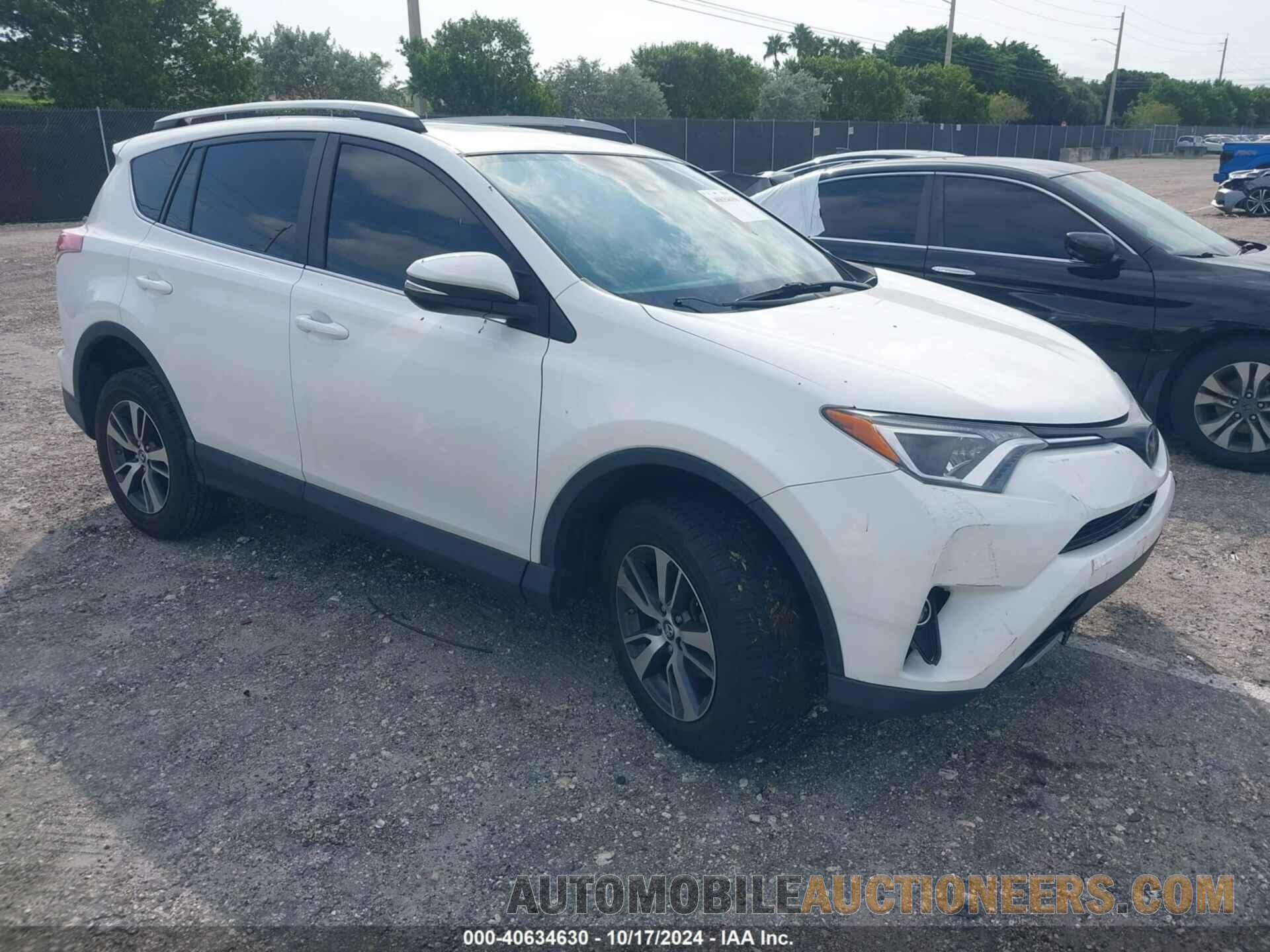 2T3WFREV0JW519564 TOYOTA RAV4 2018