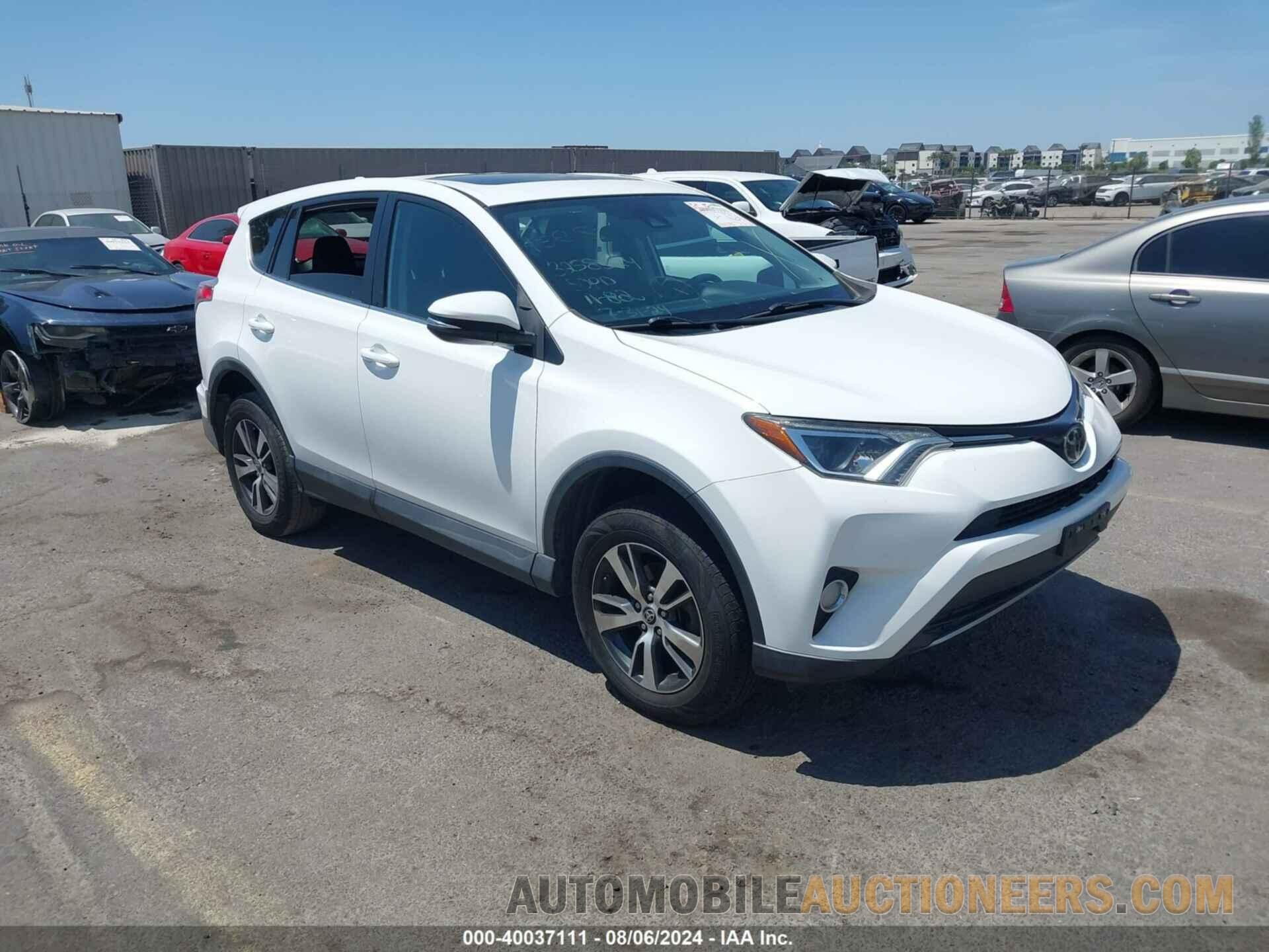 2T3WFREV1JW470424 TOYOTA RAV4 2018