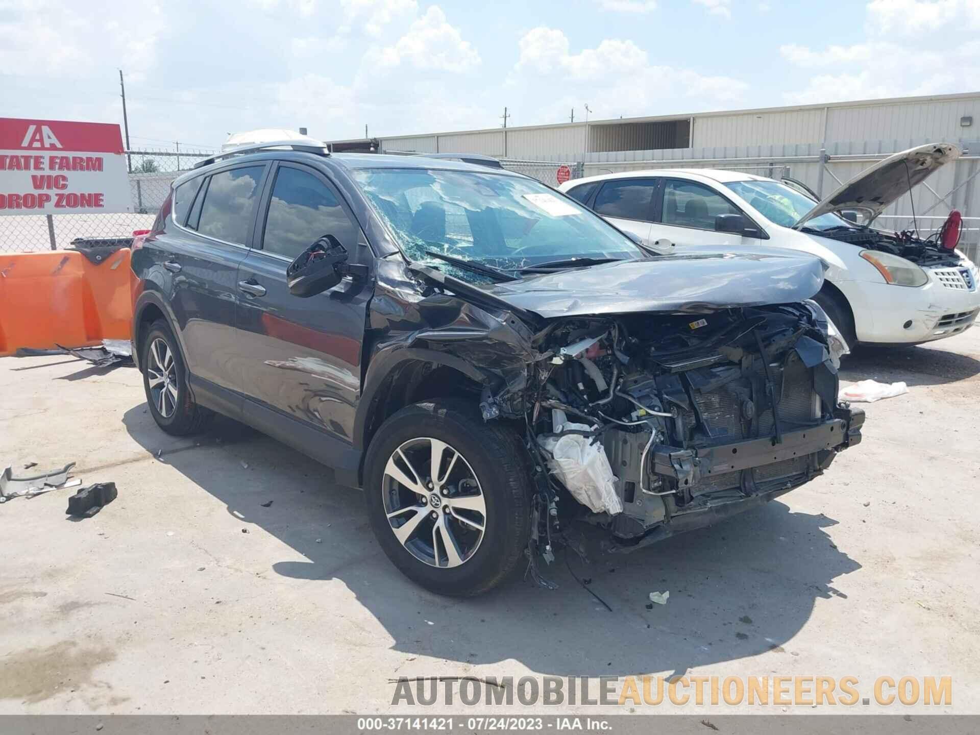 2T3WFREV3JW521809 TOYOTA RAV4 2018