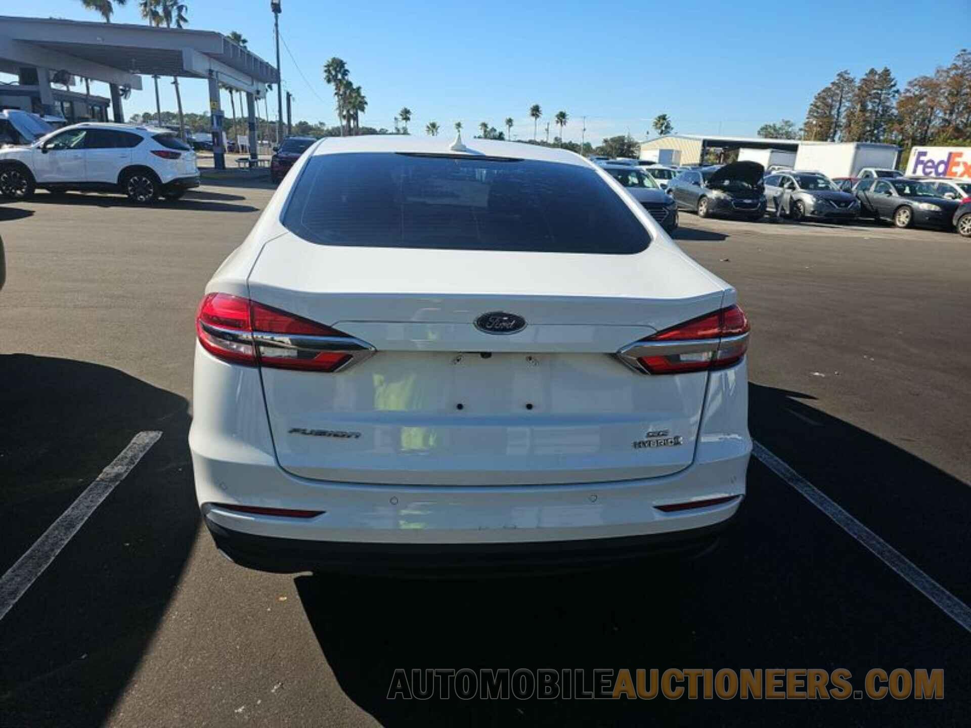 3FA6P0LU3KR183973 FORD FUSION HYBRID 2019