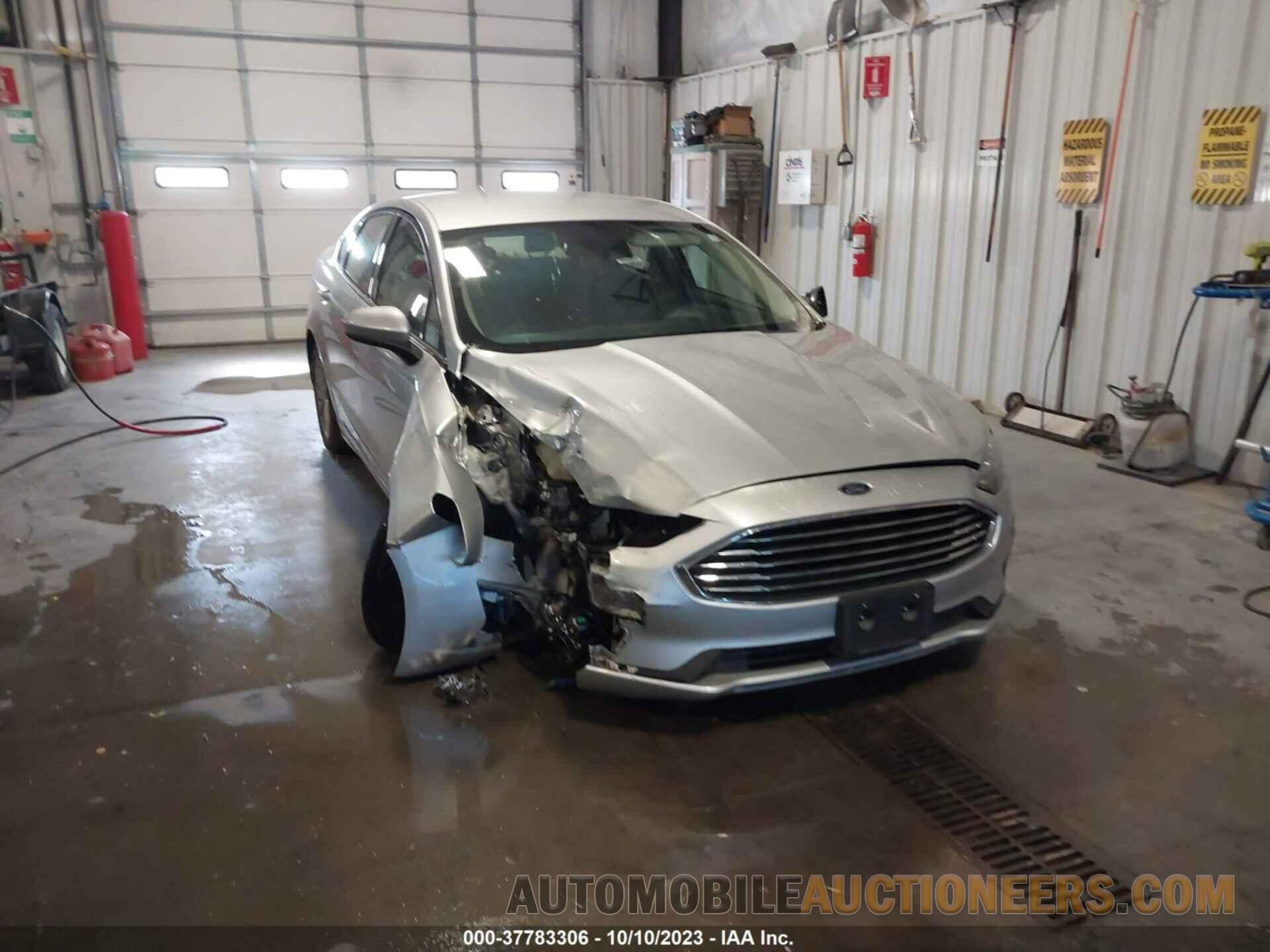 3FA6P0LU7KR124425 FORD FUSION HYBRID 2019