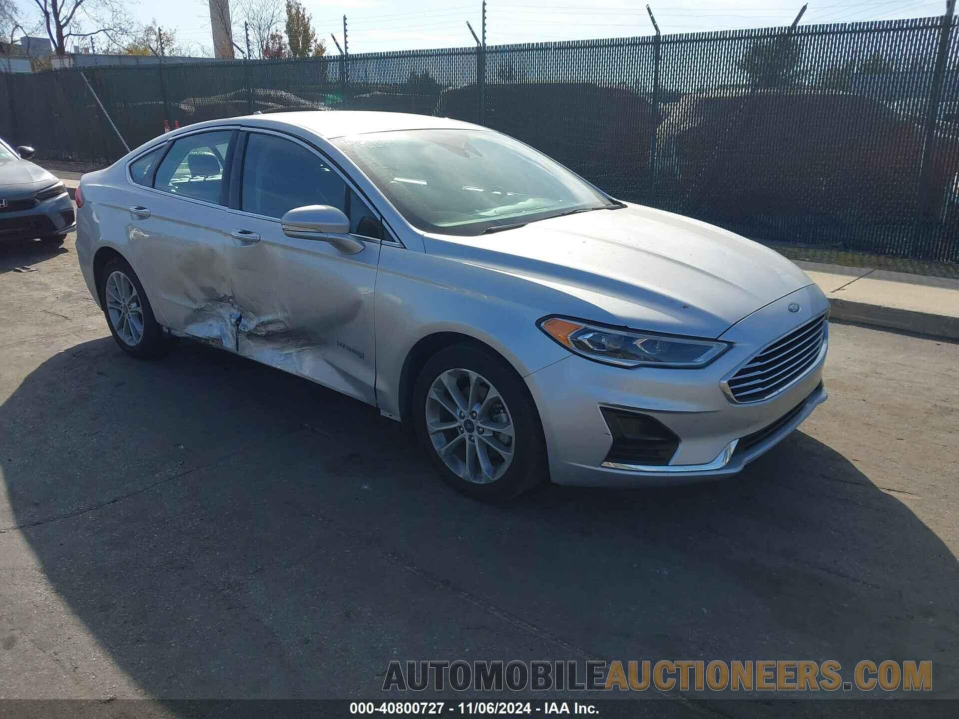 3FA6P0MU8KR119667 FORD FUSION HYBRID 2019