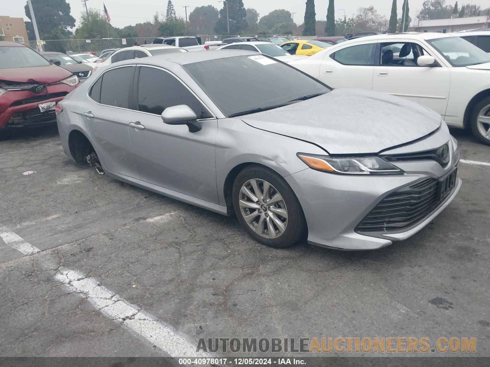 4T1B11HK3KU212982 TOYOTA CAMRY 2019