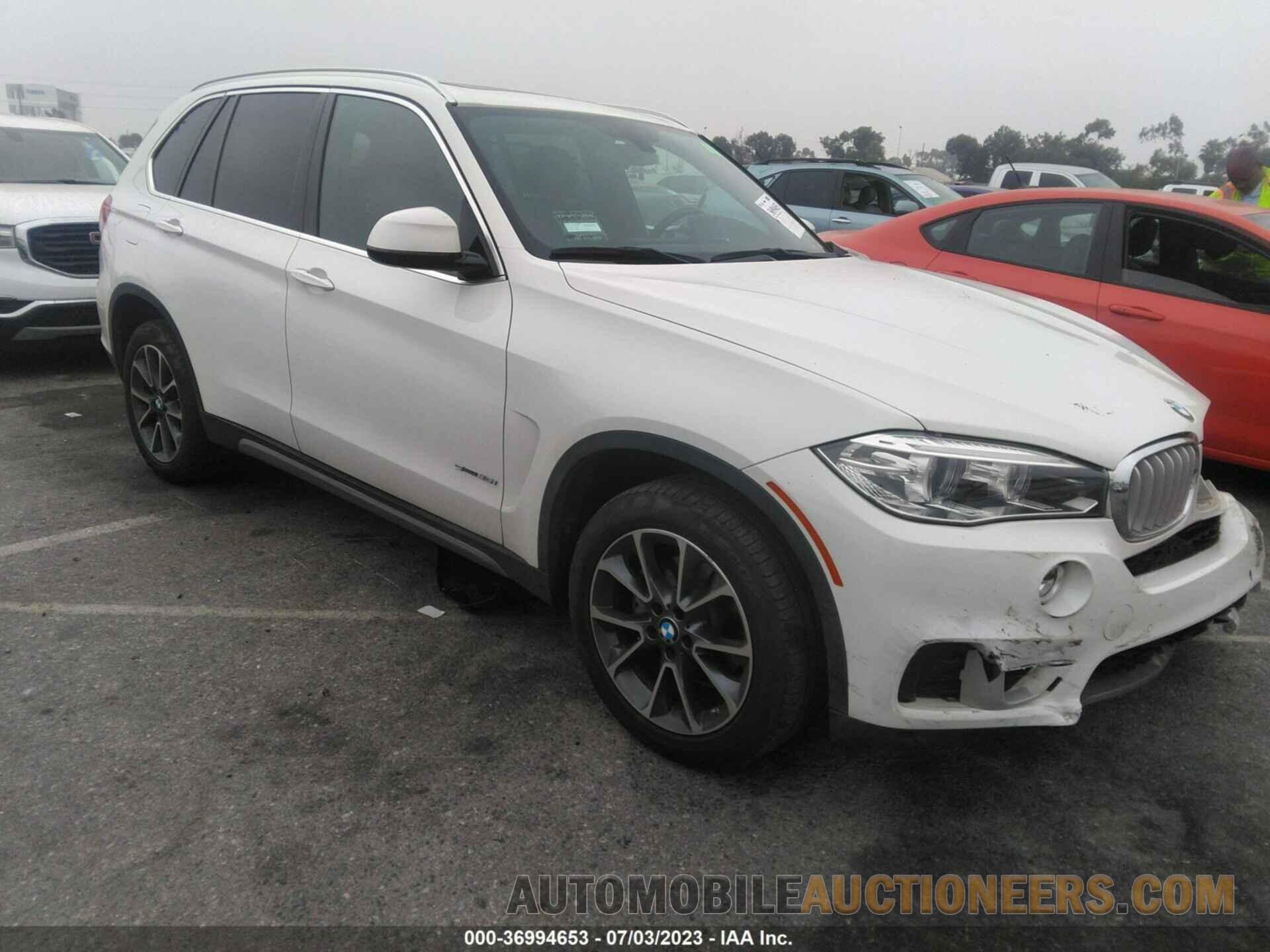 5UXKR2C50J0X07990 BMW X5 2018