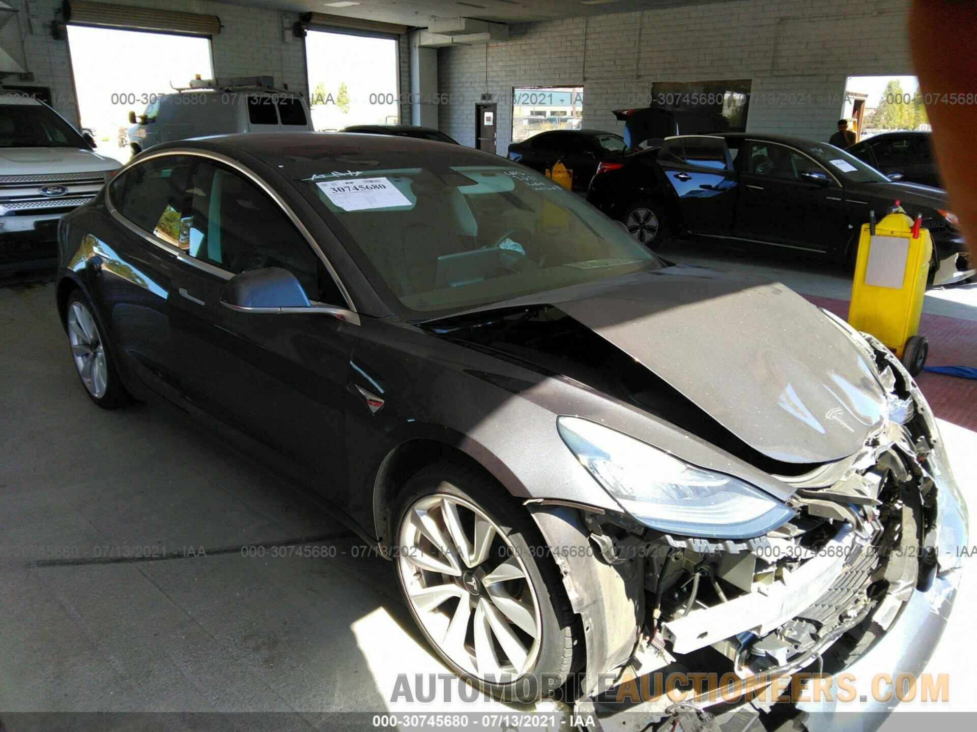 5YJ3E1EA0JF023898 TESLA MODEL 3 2018