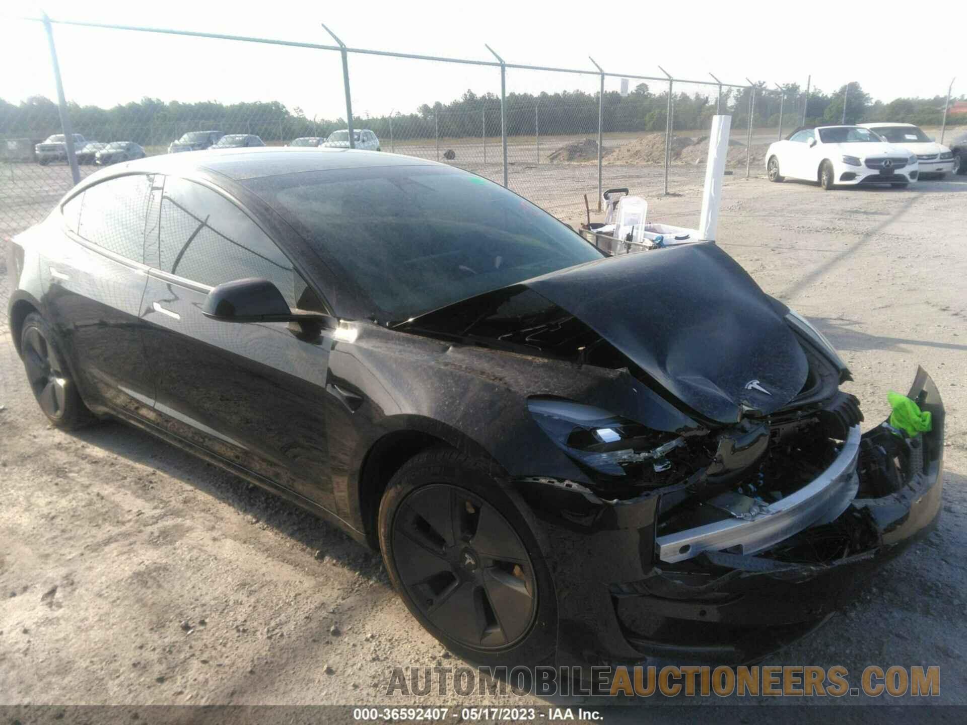 5YJ3E1EA0MF016874 TESLA MODEL 3 2021