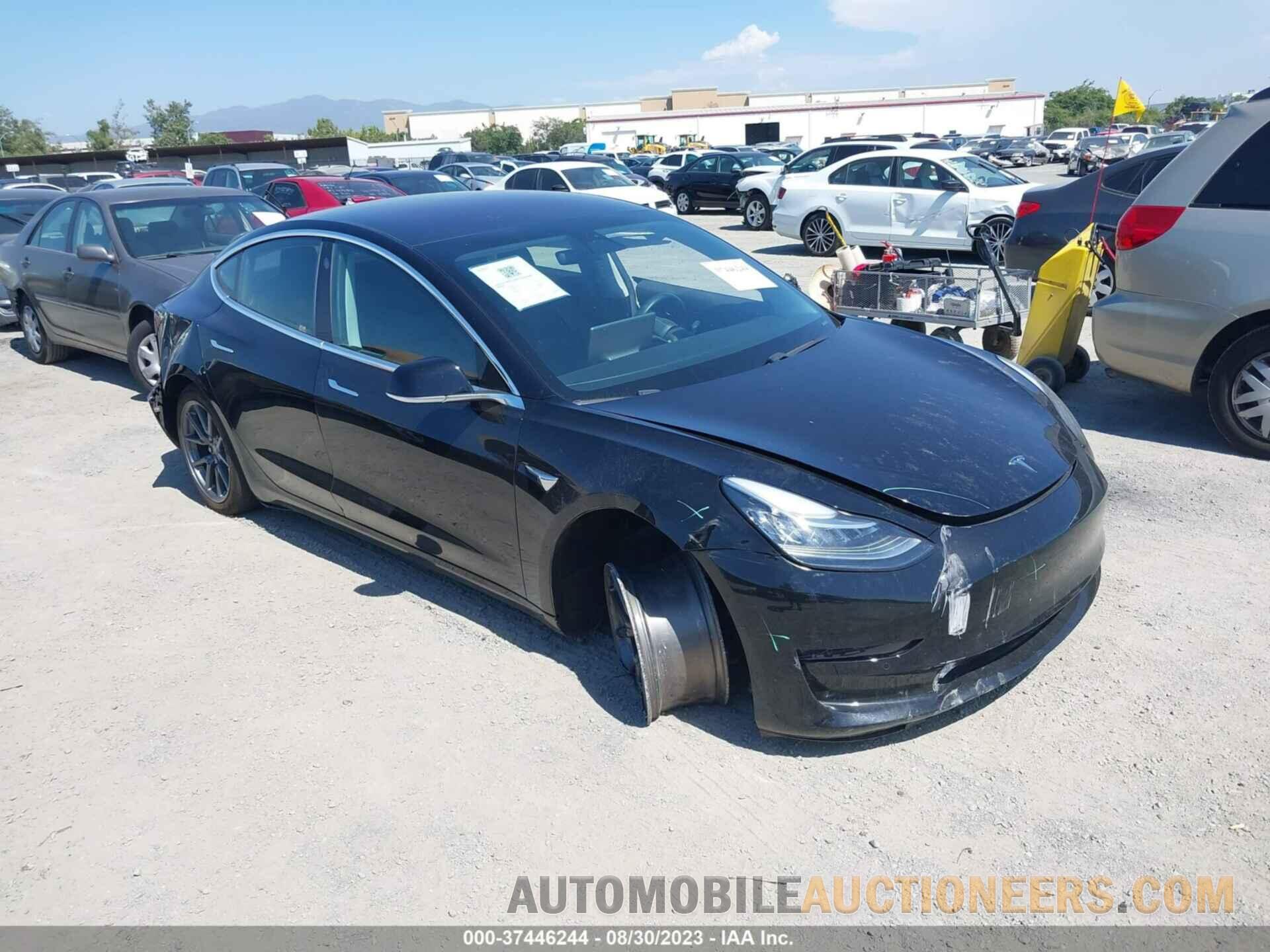 5YJ3E1EA3JF013995 TESLA MODEL 3 2018