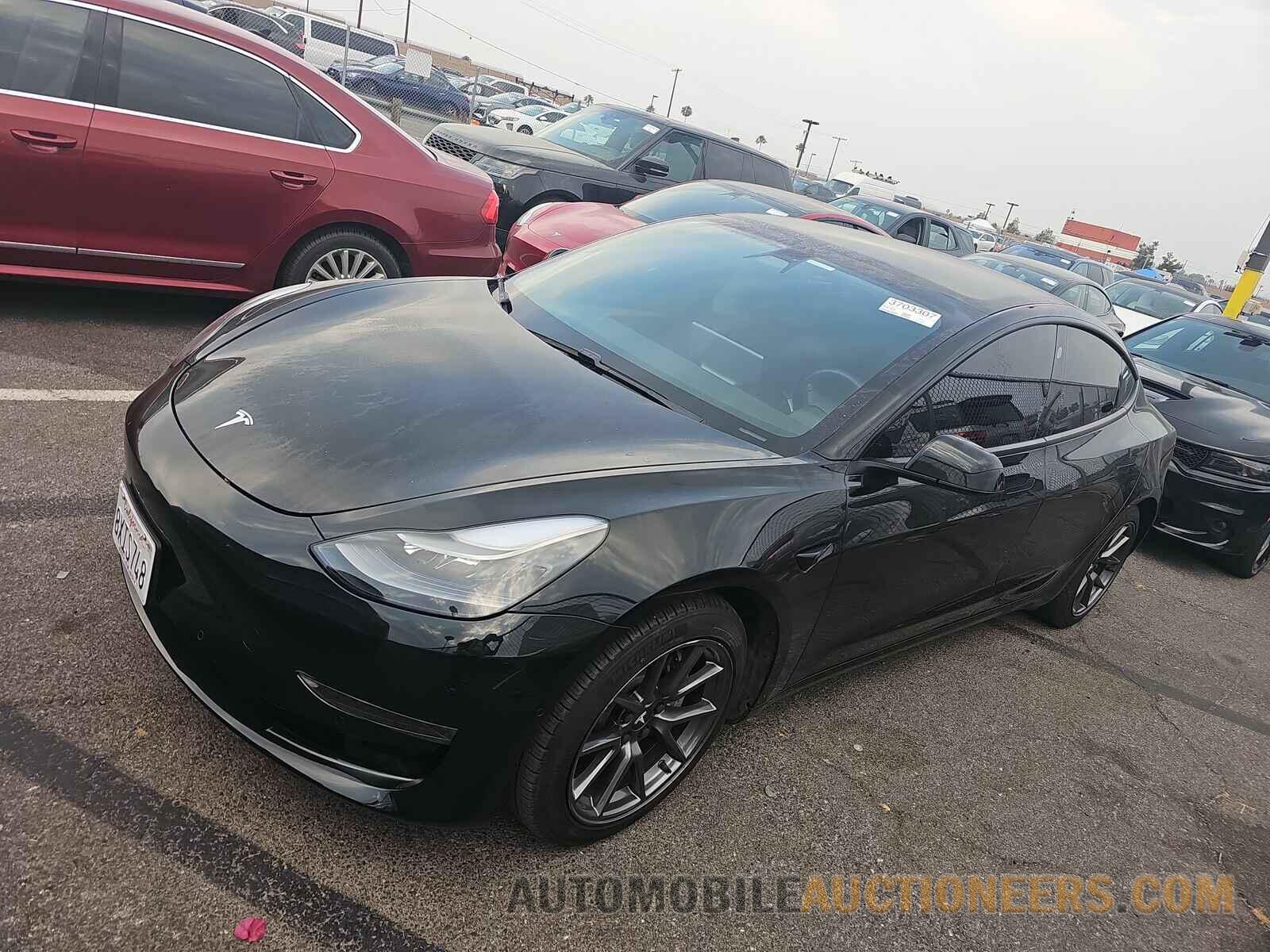 5YJ3E1EA3MF003018 Tesla Model 3 2021