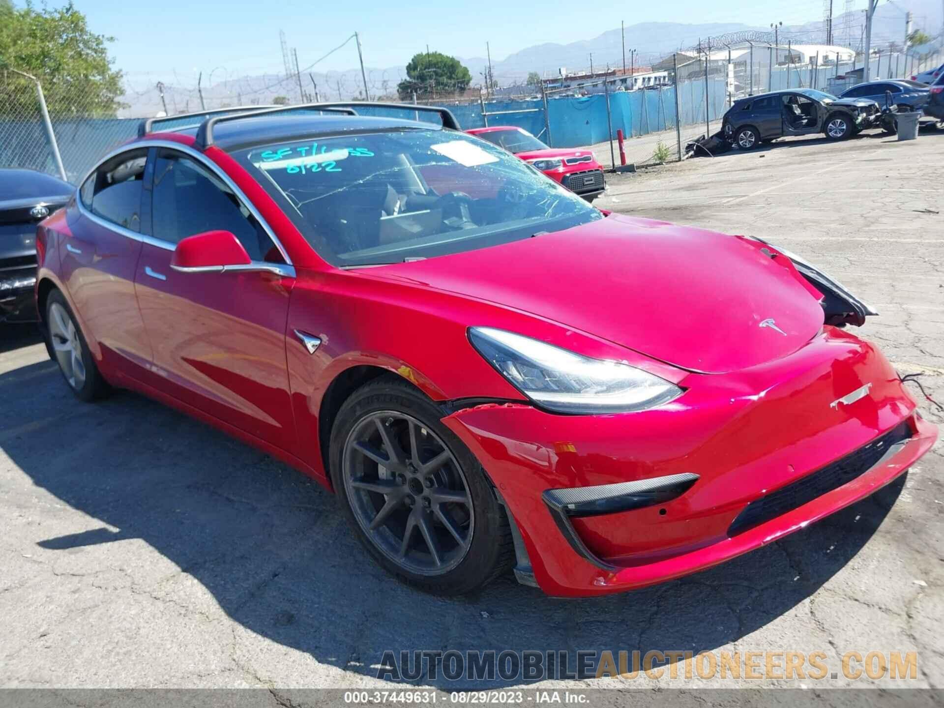 5YJ3E1EA7JF058082 TESLA MODEL 3 2018