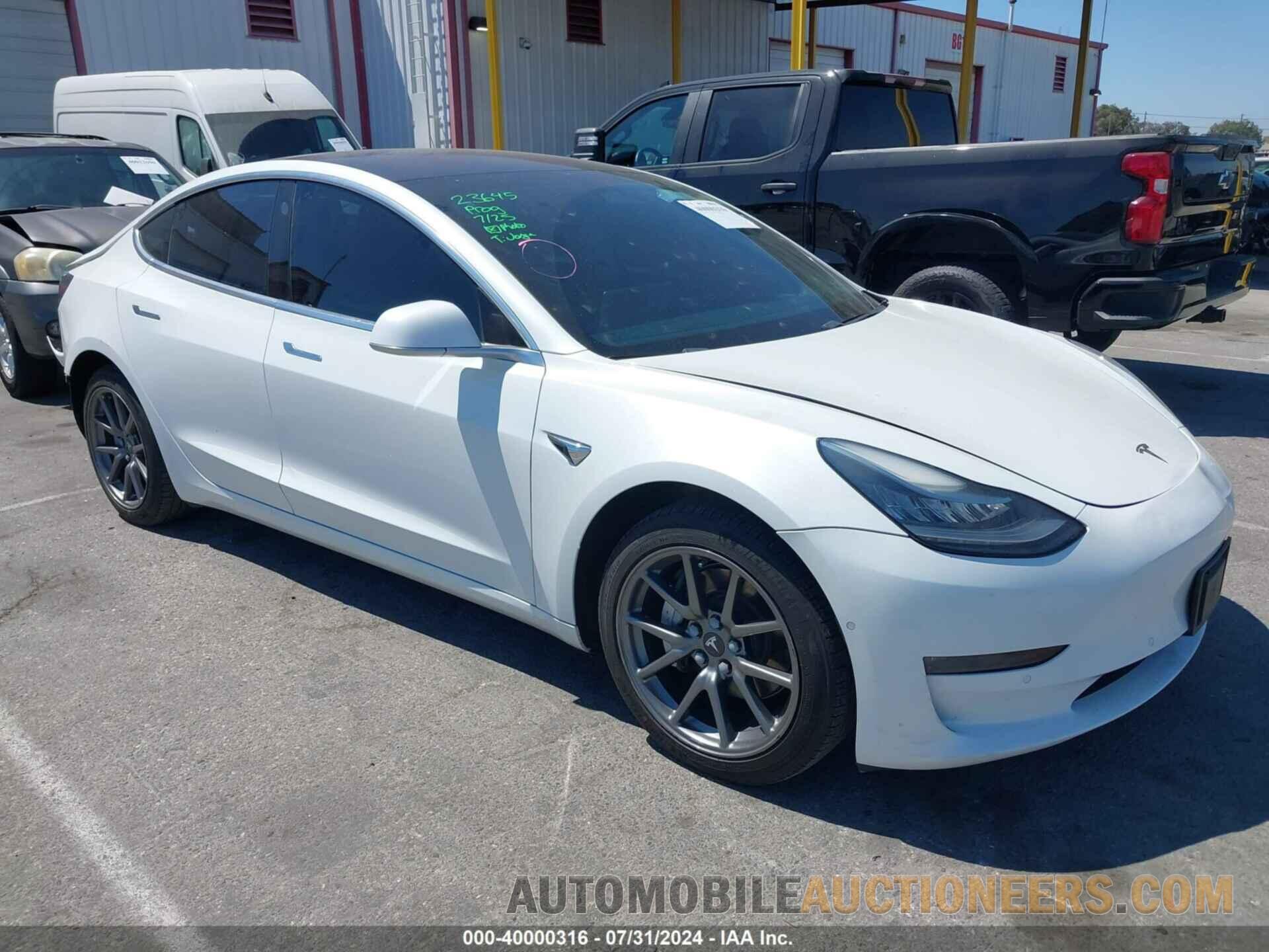 5YJ3E1EA9JF046001 TESLA MODEL 3 2018