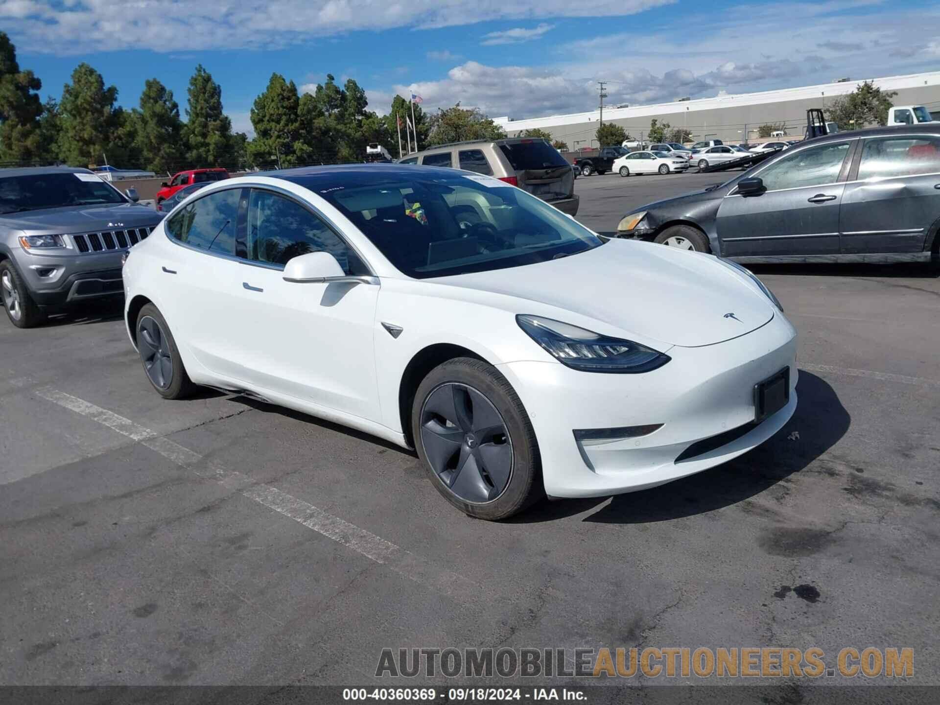 5YJ3E1EAXJF009233 TESLA MODEL 3 2018