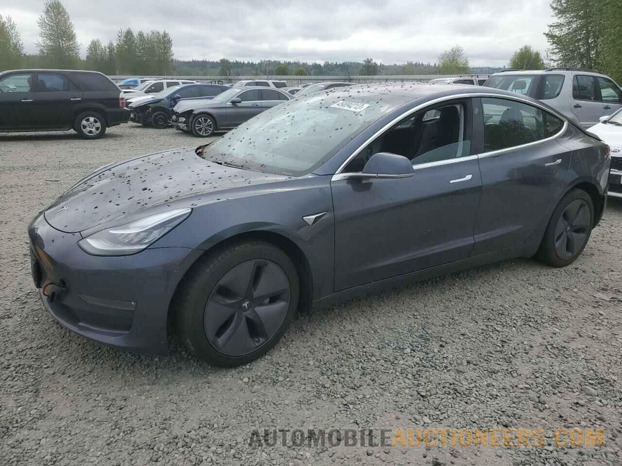 5YJ3E1EAXJF052065 TESLA MODEL 3 2018