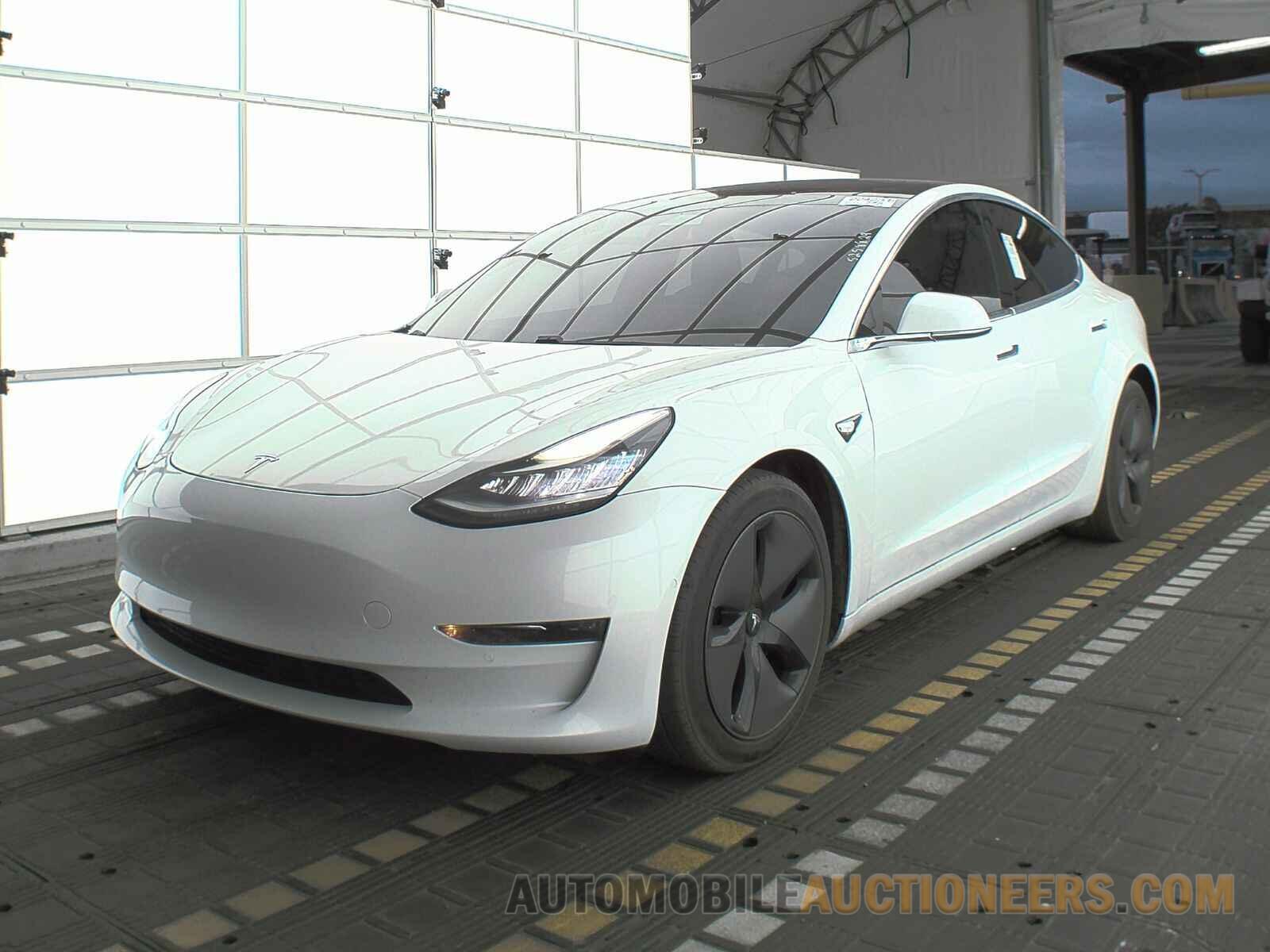 5YJ3E1EB3JF067001 Tesla Model 3 2018