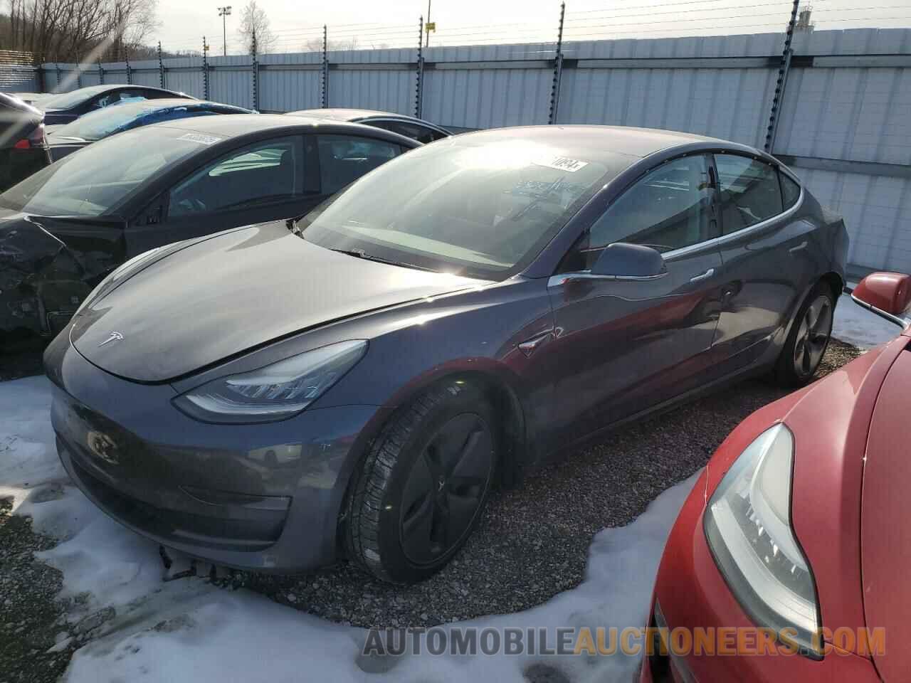 5YJ3E1EB3JF104001 TESLA MODEL 3 2018