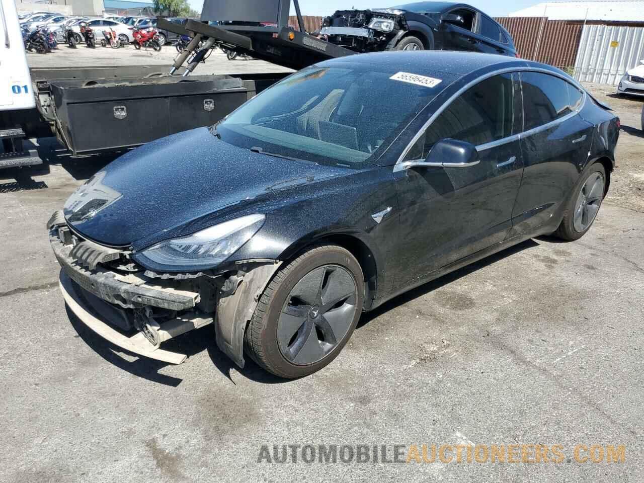 5YJ3E1EB3JF129738 TESLA MODEL 3 2018