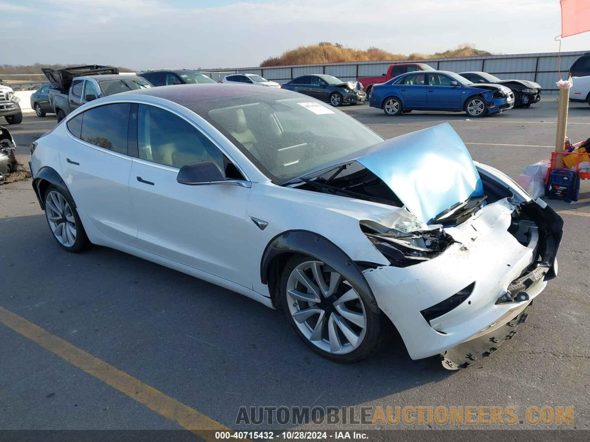 5YJ3E1EB4JF187521 TESLA MODEL 3 2018