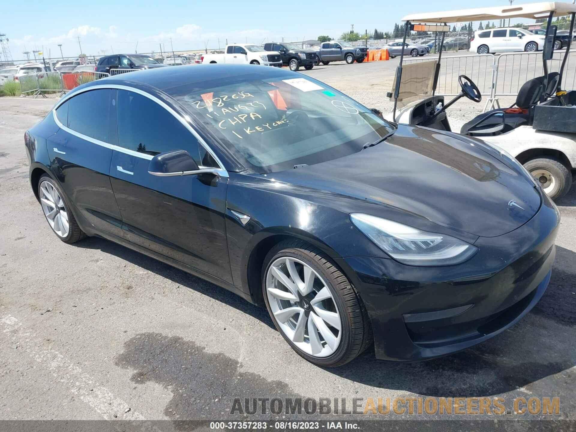 5YJ3E1EB7JF184712 TESLA MODEL 3 2018