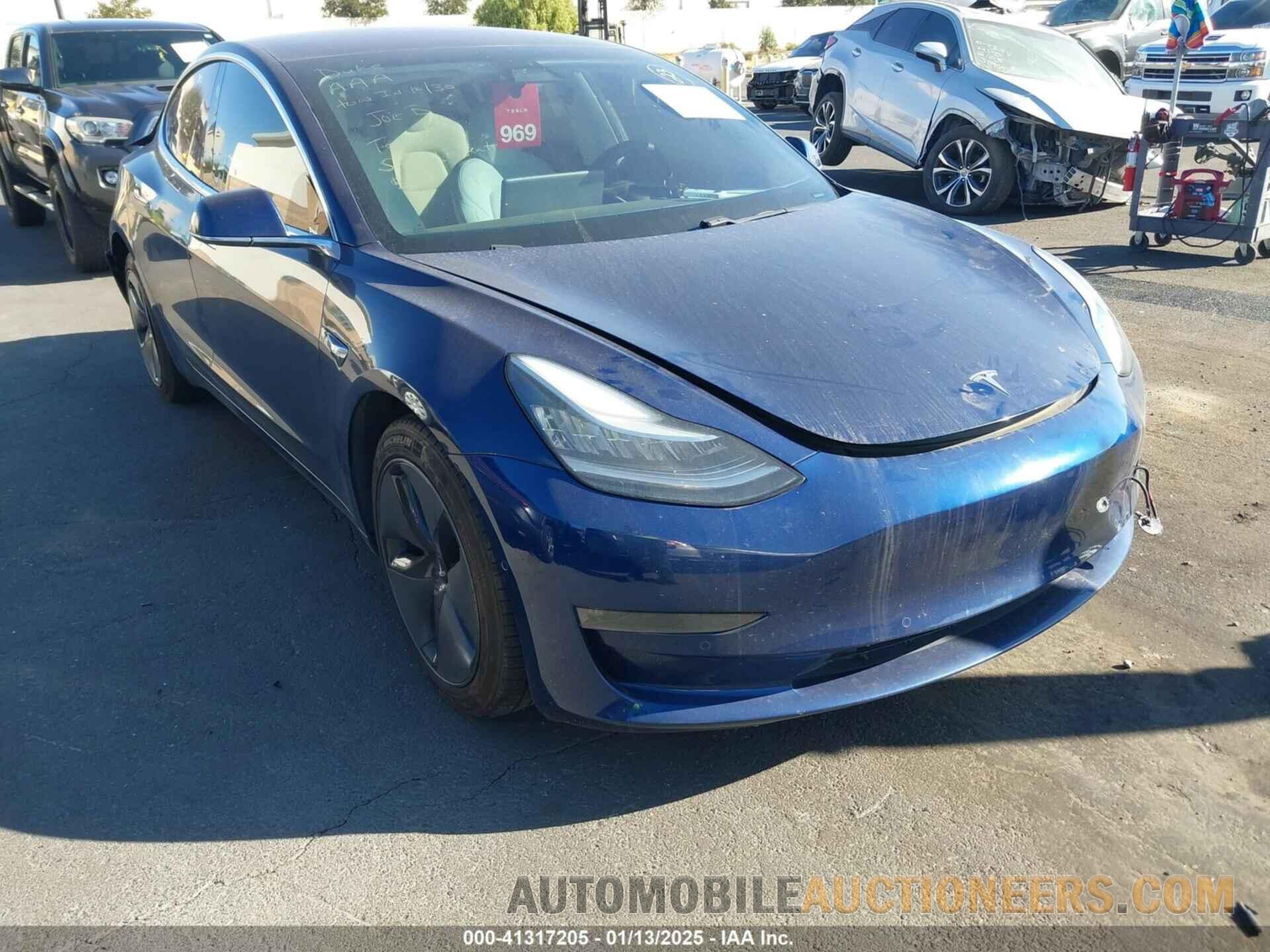 5YJ3E1EBXJF099914 TESLA MODEL 3 2018