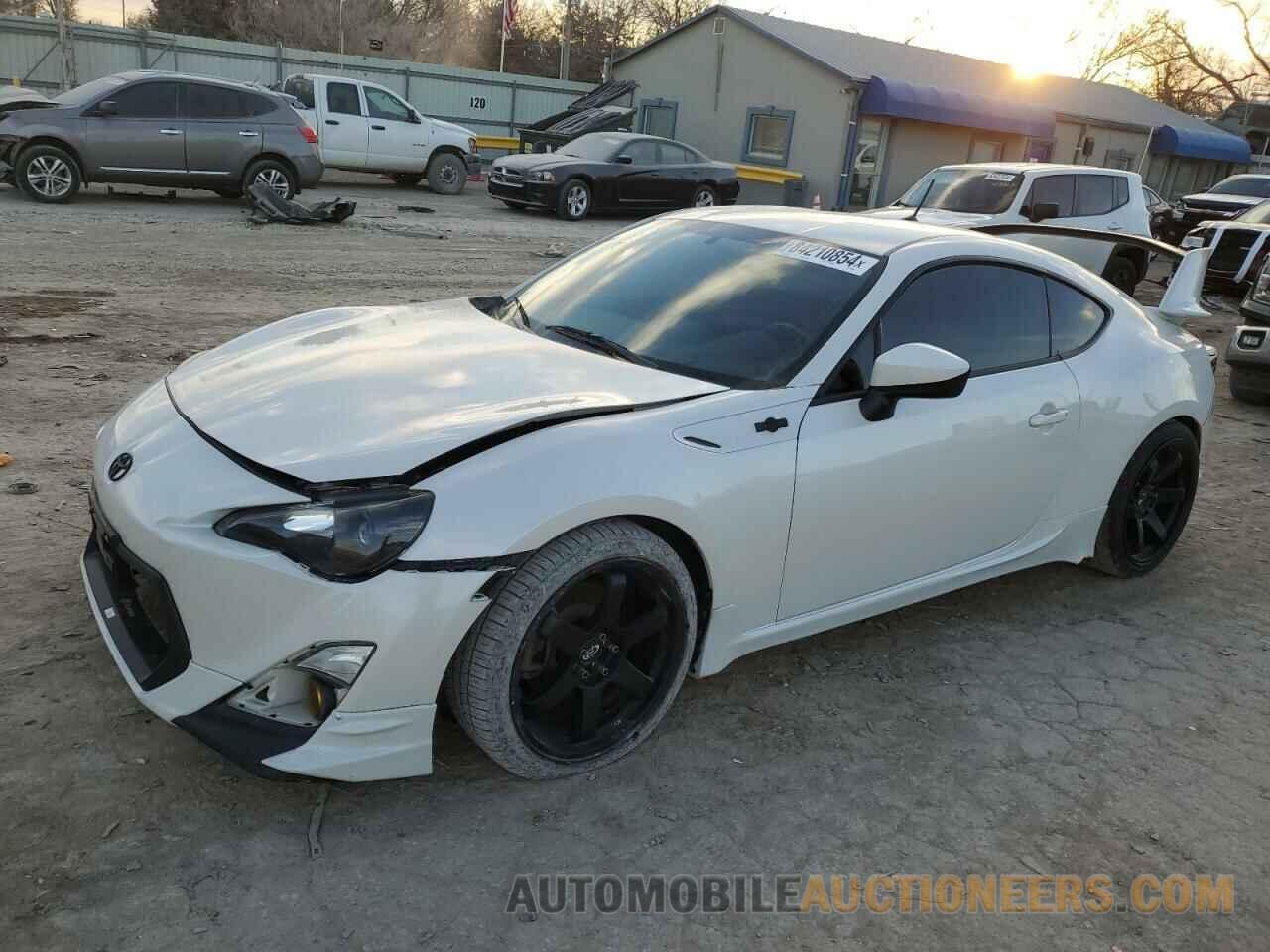 JF1ZNAA12E9707695 TOYOTA SCION 2014