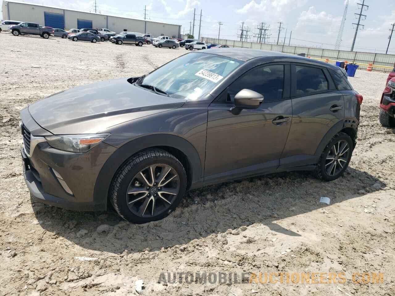 JM1DKFC79J0318417 MAZDA CX-3 2018