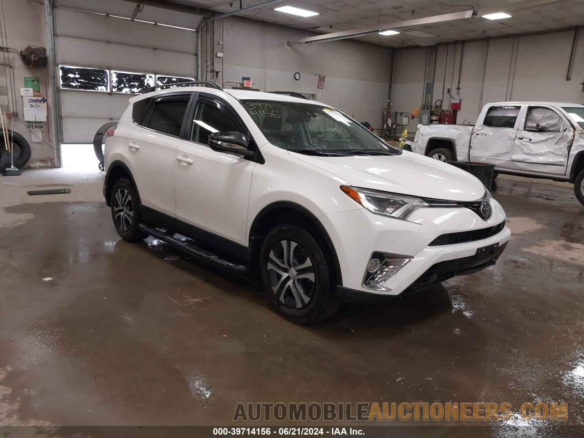 JTMBFREV9JJ178694 TOYOTA RAV4 2018