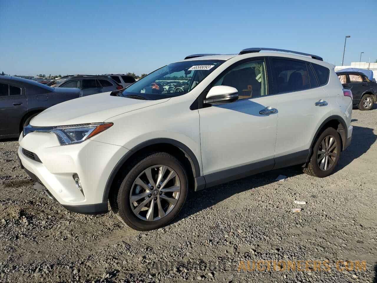 JTMDFREV9GJ056130 TOYOTA RAV4 2016