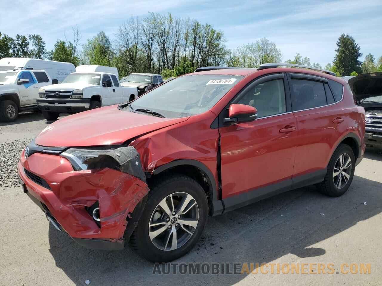 JTMRFREV7GJ097104 TOYOTA RAV4 2016