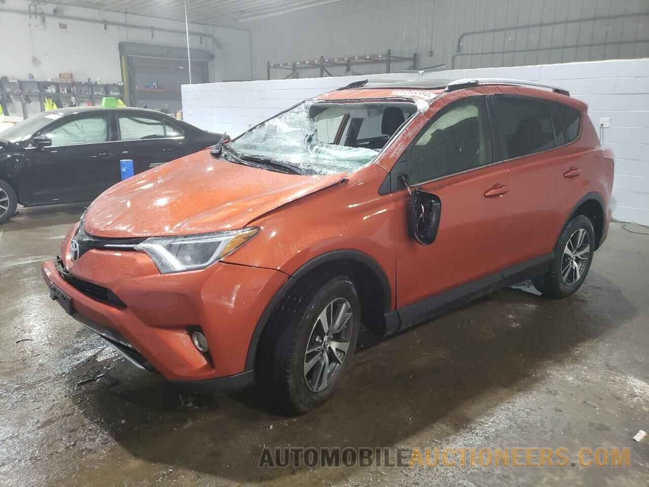 JTMRFREV7GJ099807 TOYOTA RAV4 2016