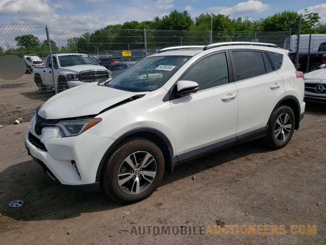 JTMRFREV7GJ101054 TOYOTA RAV4 2016