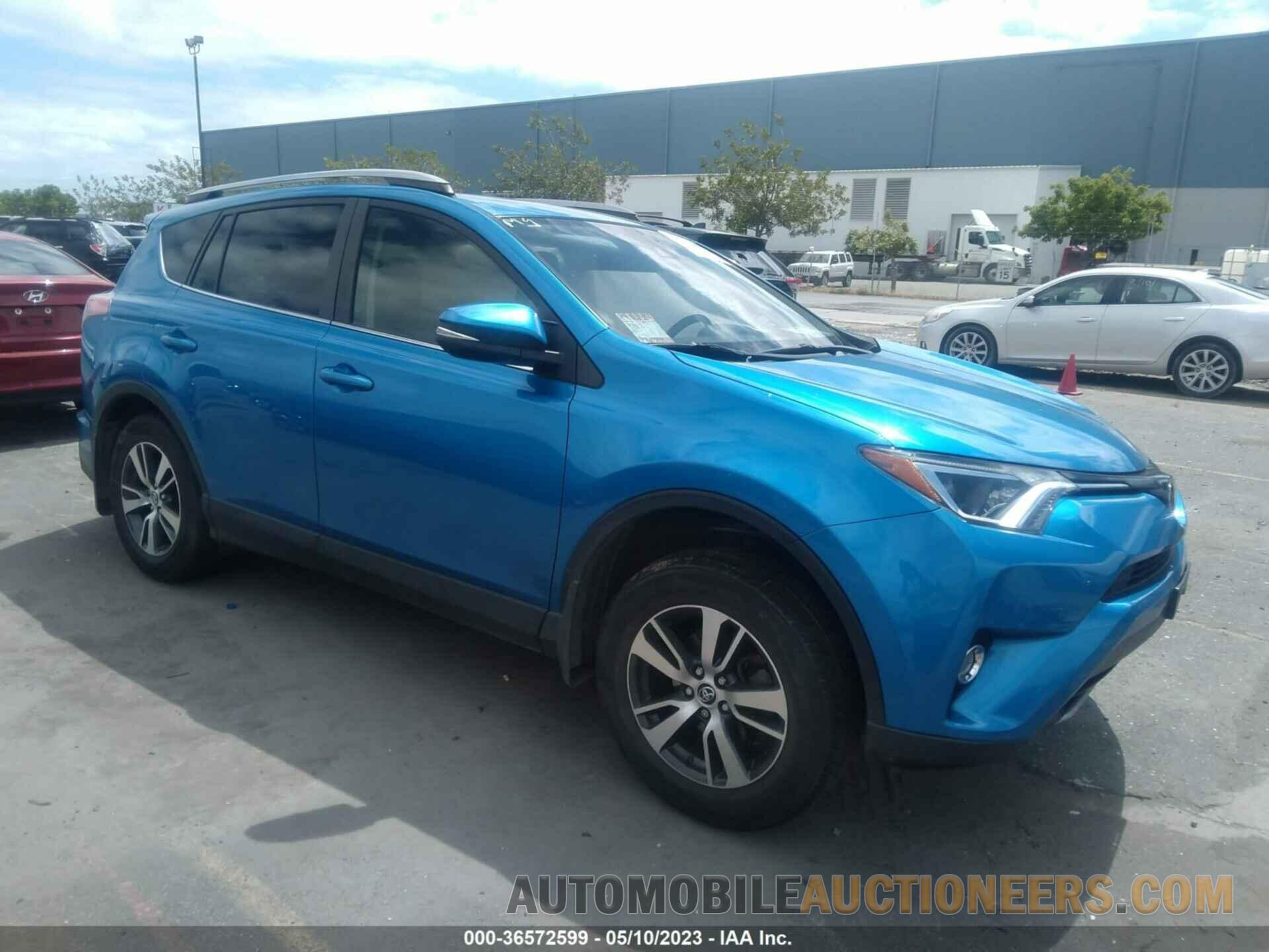 JTMWFREV1JJ162393 TOYOTA RAV4 2018