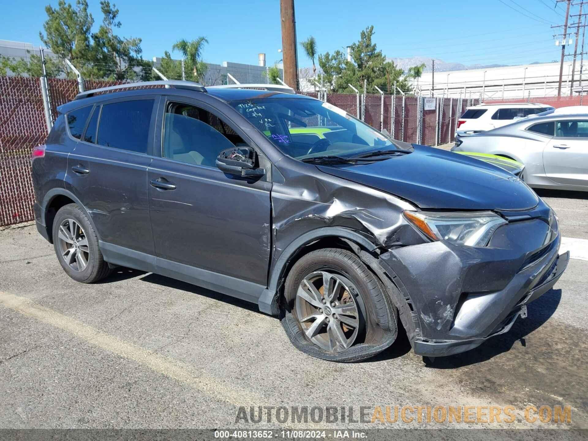 JTMWFREV4JJ161724 TOYOTA RAV4 2018