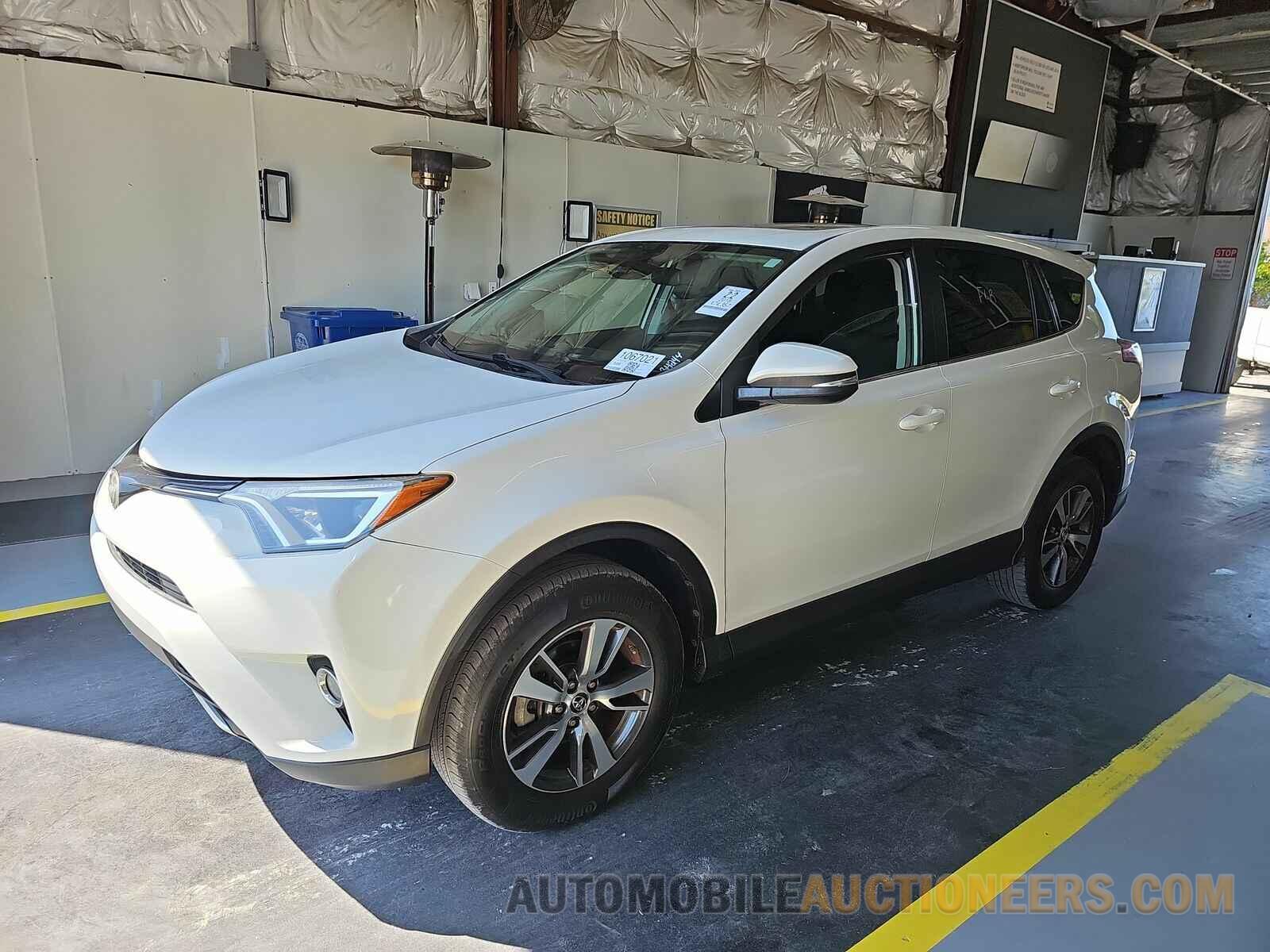 JTMWFREV4JJ210176 Toyota RAV4 2018