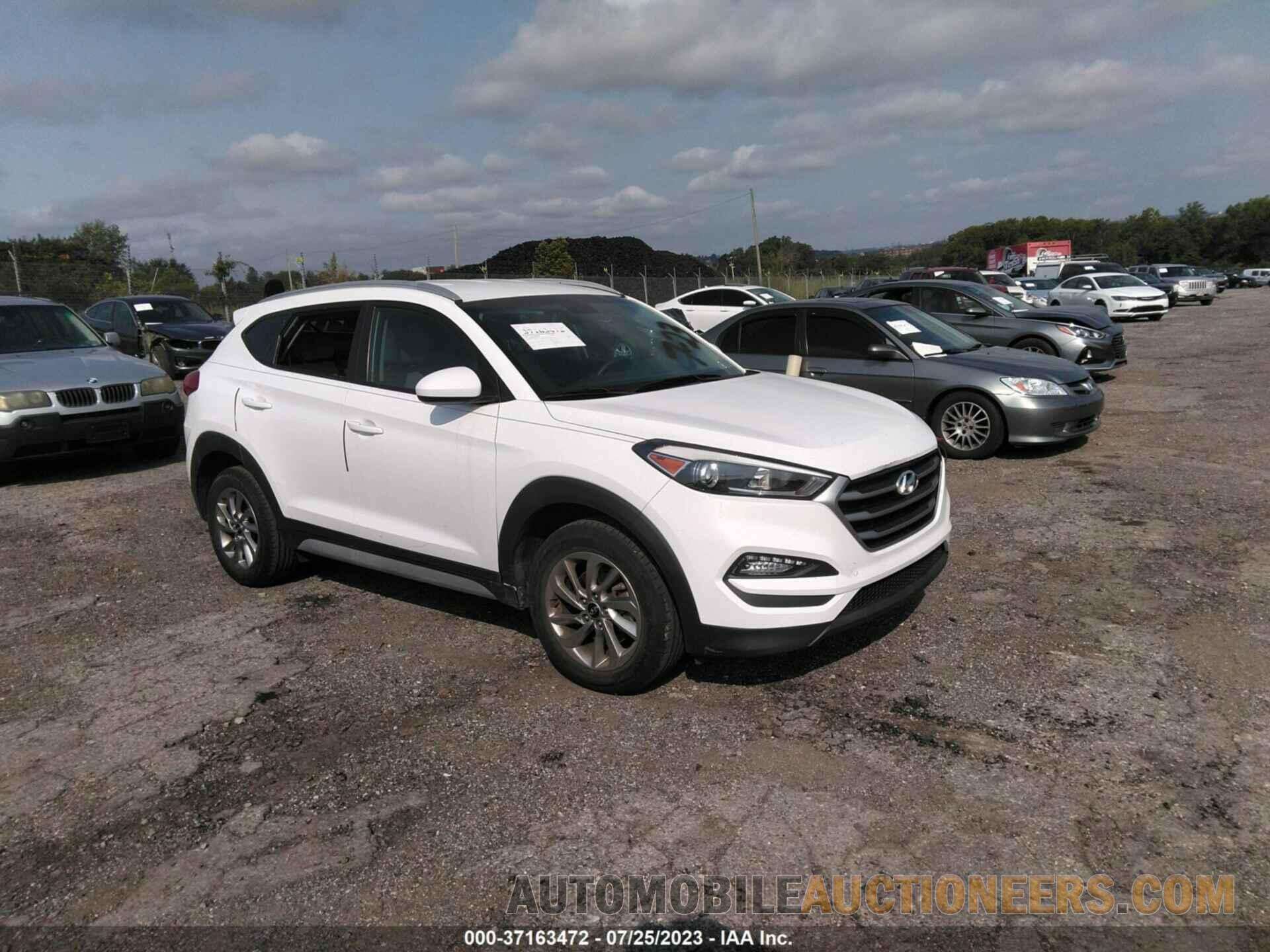 KM8J33A46JU715014 HYUNDAI TUCSON 2018