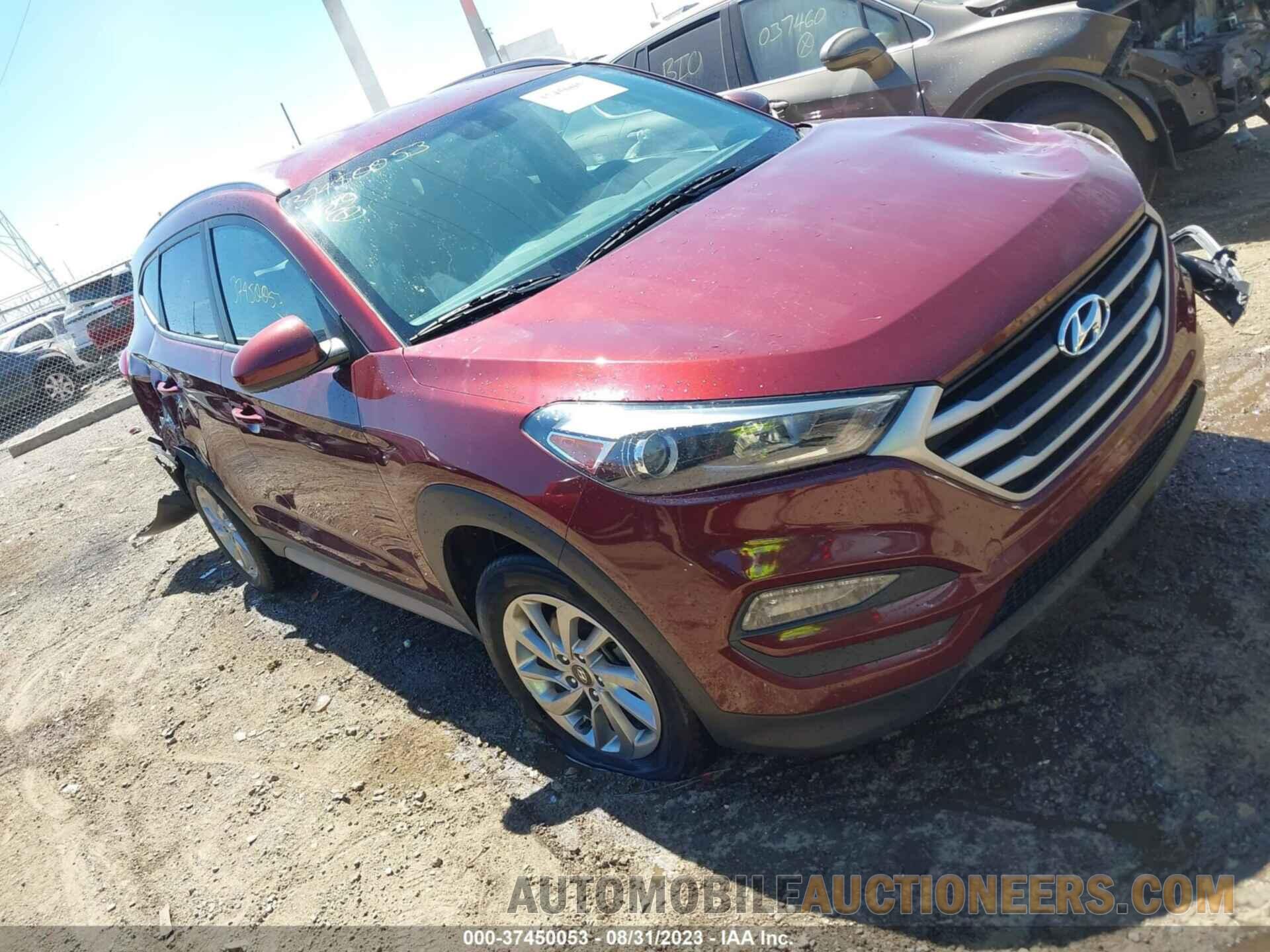 KM8J3CA40JU664979 HYUNDAI TUCSON 2018