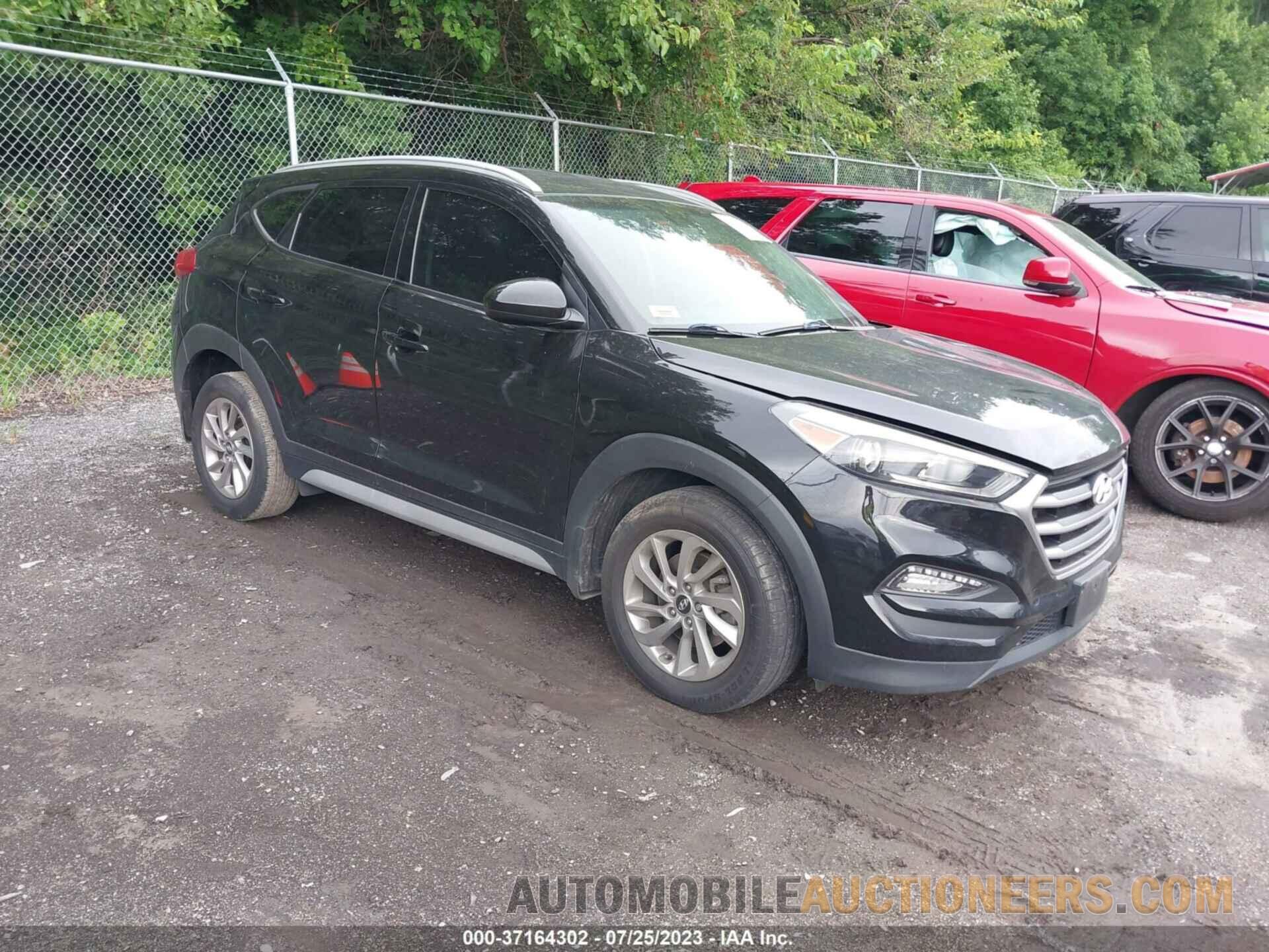 KM8J3CA40JU718989 HYUNDAI TUCSON 2018