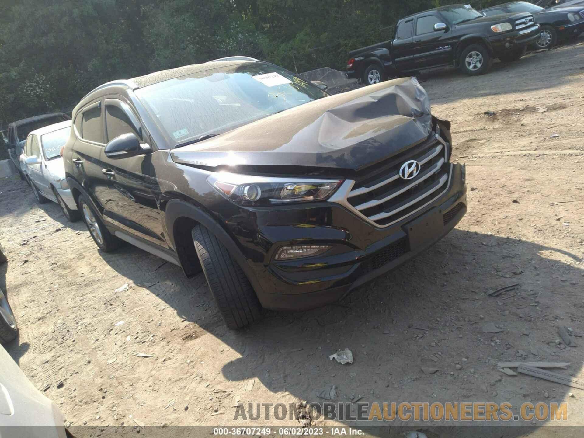 KM8J3CA40JU754309 HYUNDAI TUCSON 2018