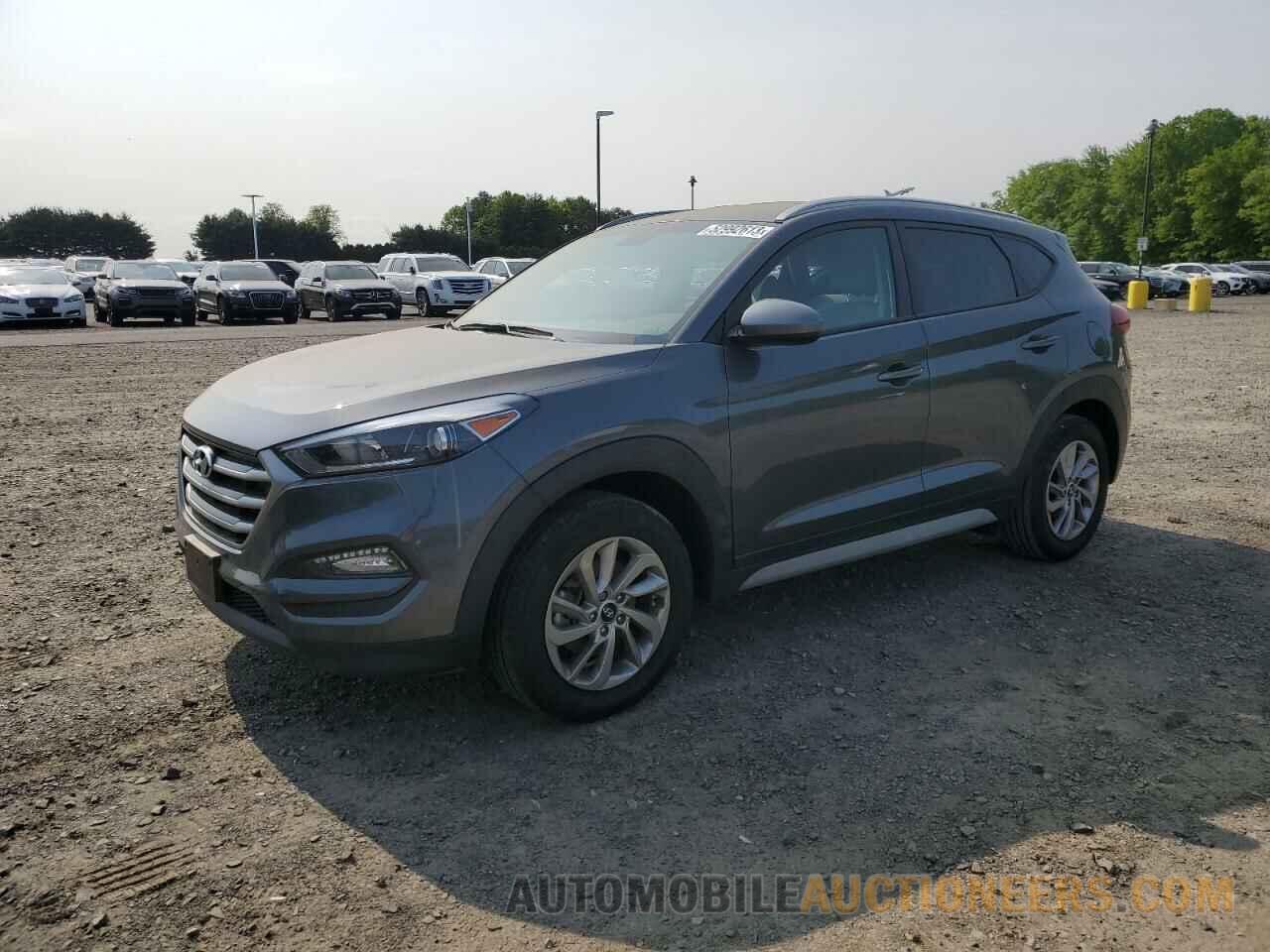 KM8J3CA40JU806988 HYUNDAI TUCSON 2018