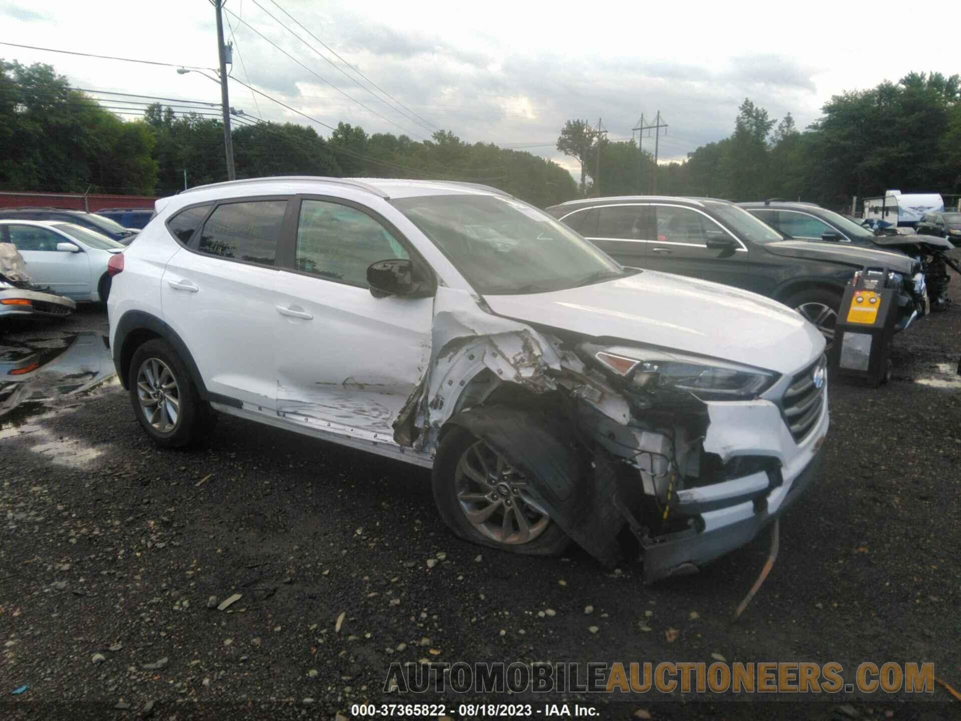 KM8J3CA41JU698011 HYUNDAI TUCSON 2018