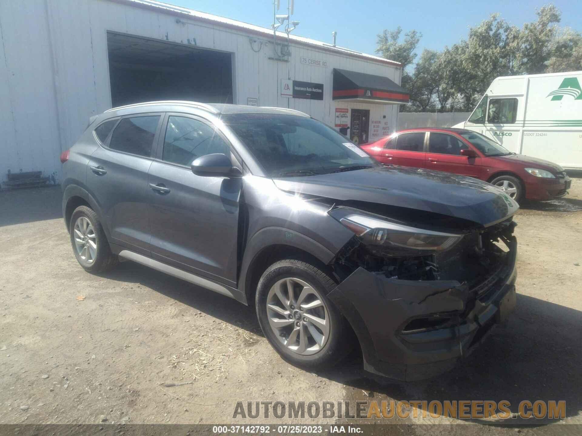 KM8J3CA41JU716653 HYUNDAI TUCSON 2018