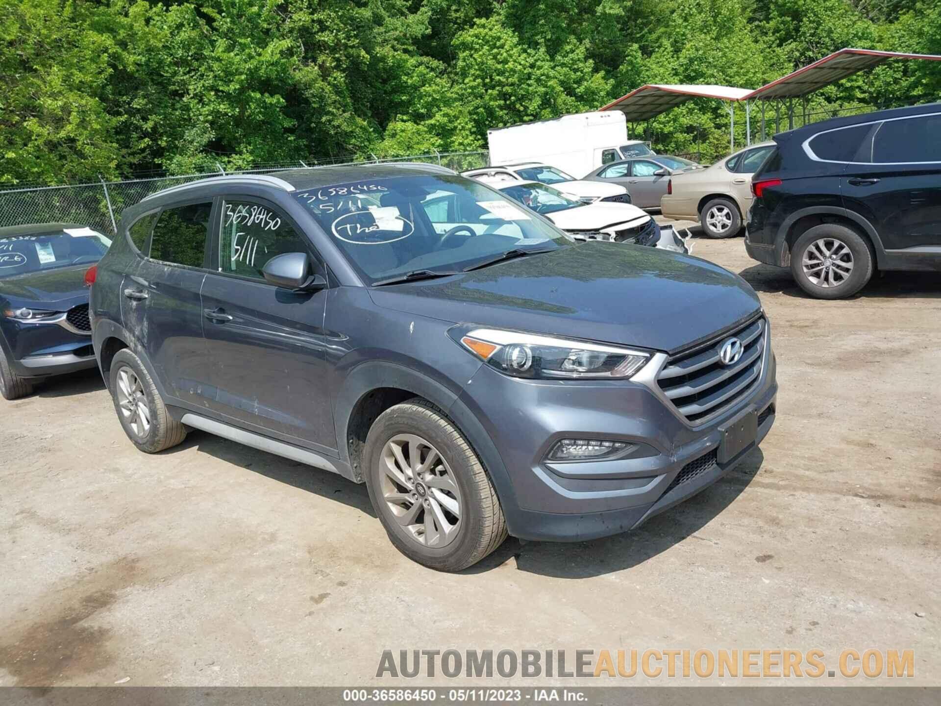 KM8J3CA44JU606213 HYUNDAI TUCSON 2018