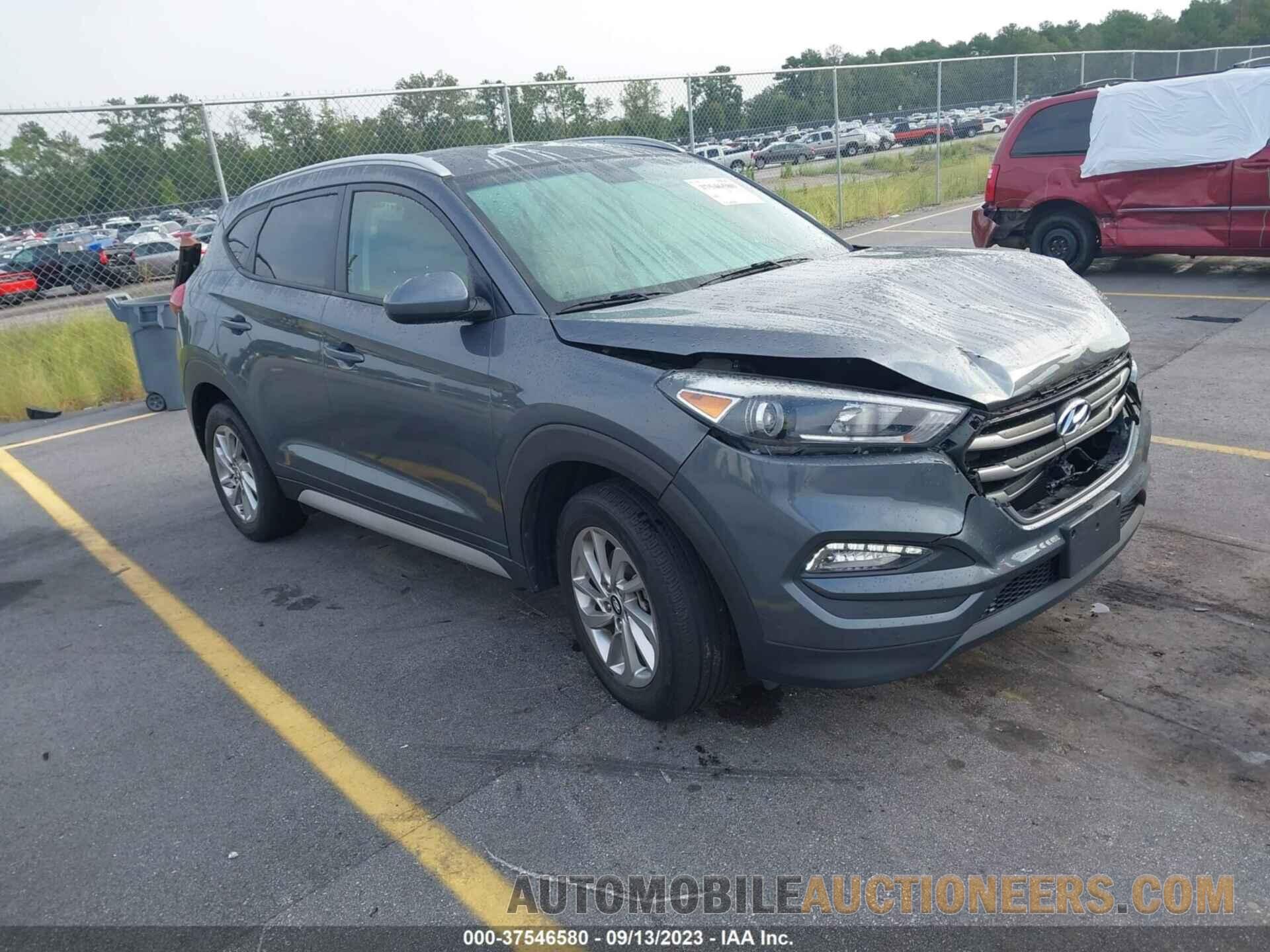 KM8J3CA44JU618703 HYUNDAI TUCSON 2018