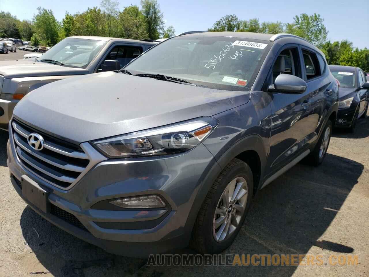 KM8J3CA45JU600081 HYUNDAI TUCSON 2018