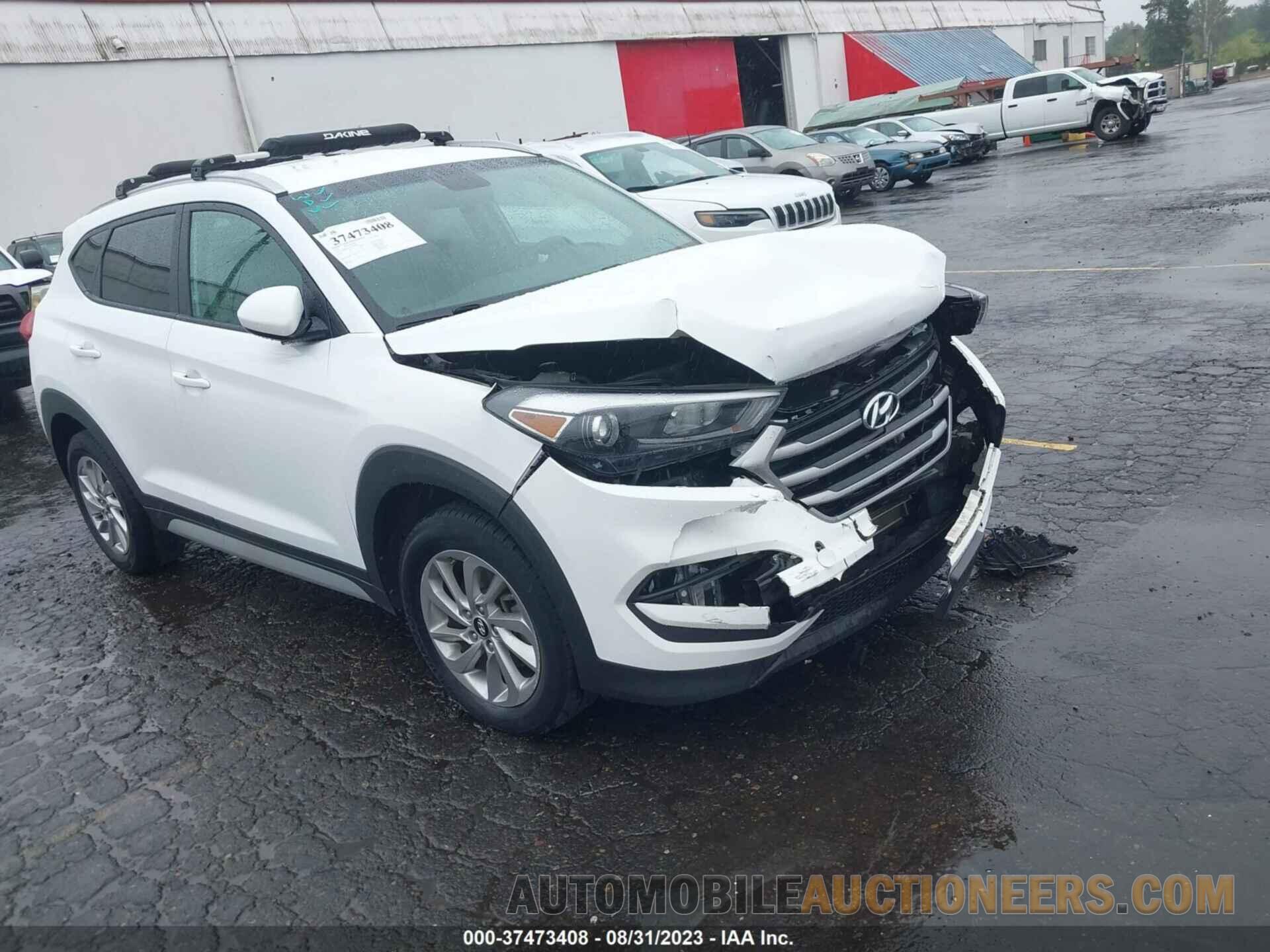 KM8J3CA45JU692809 HYUNDAI TUCSON 2018