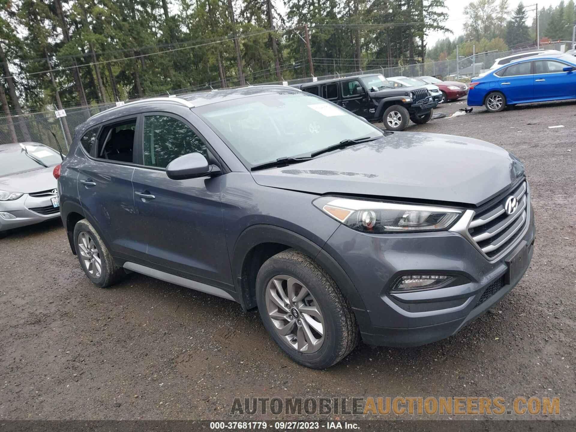 KM8J3CA46JU615799 HYUNDAI TUCSON 2018