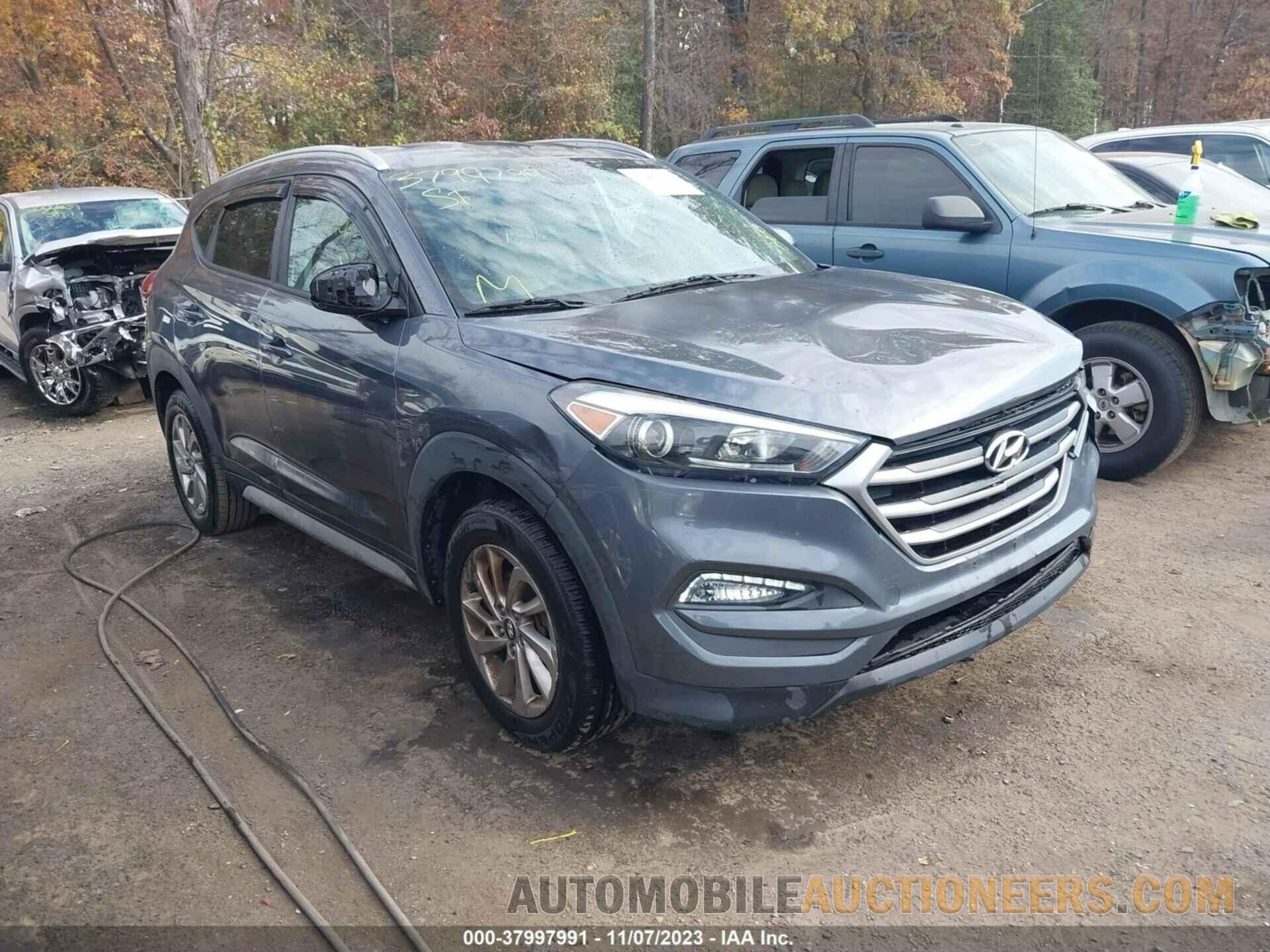 KM8J3CA46JU716924 HYUNDAI TUCSON 2018