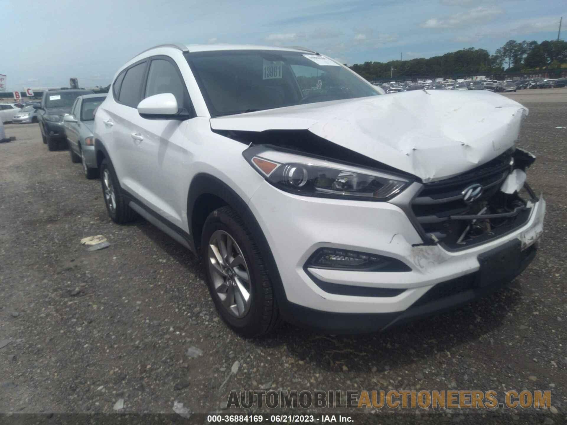 KM8J3CA46JU738082 HYUNDAI TUCSON 2018