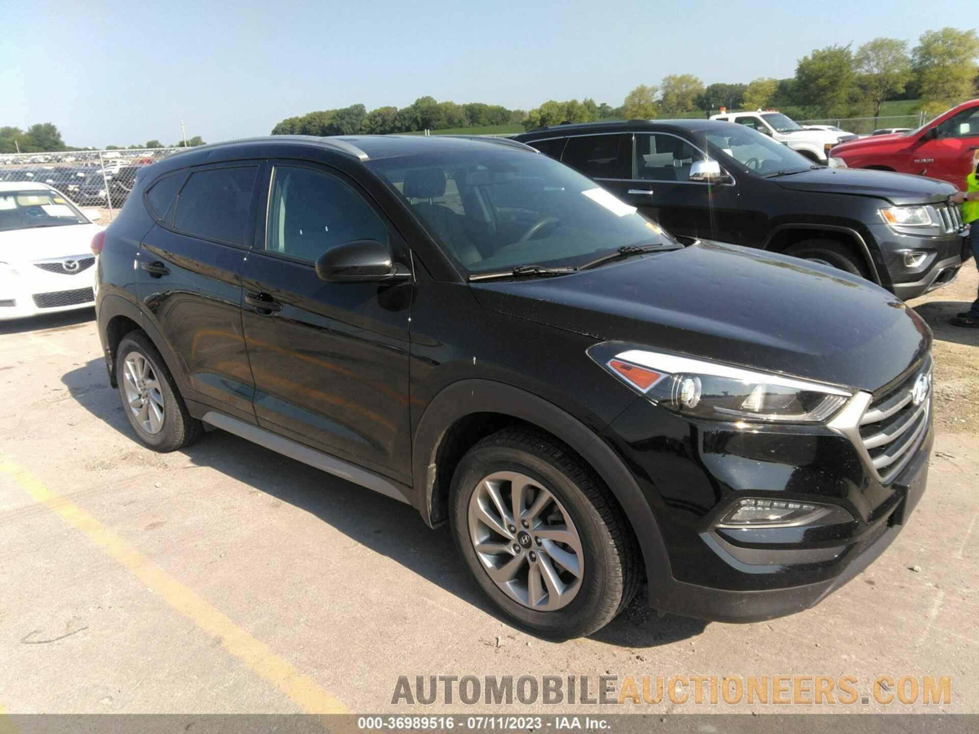 KM8J3CA47JU733098 HYUNDAI TUCSON 2018