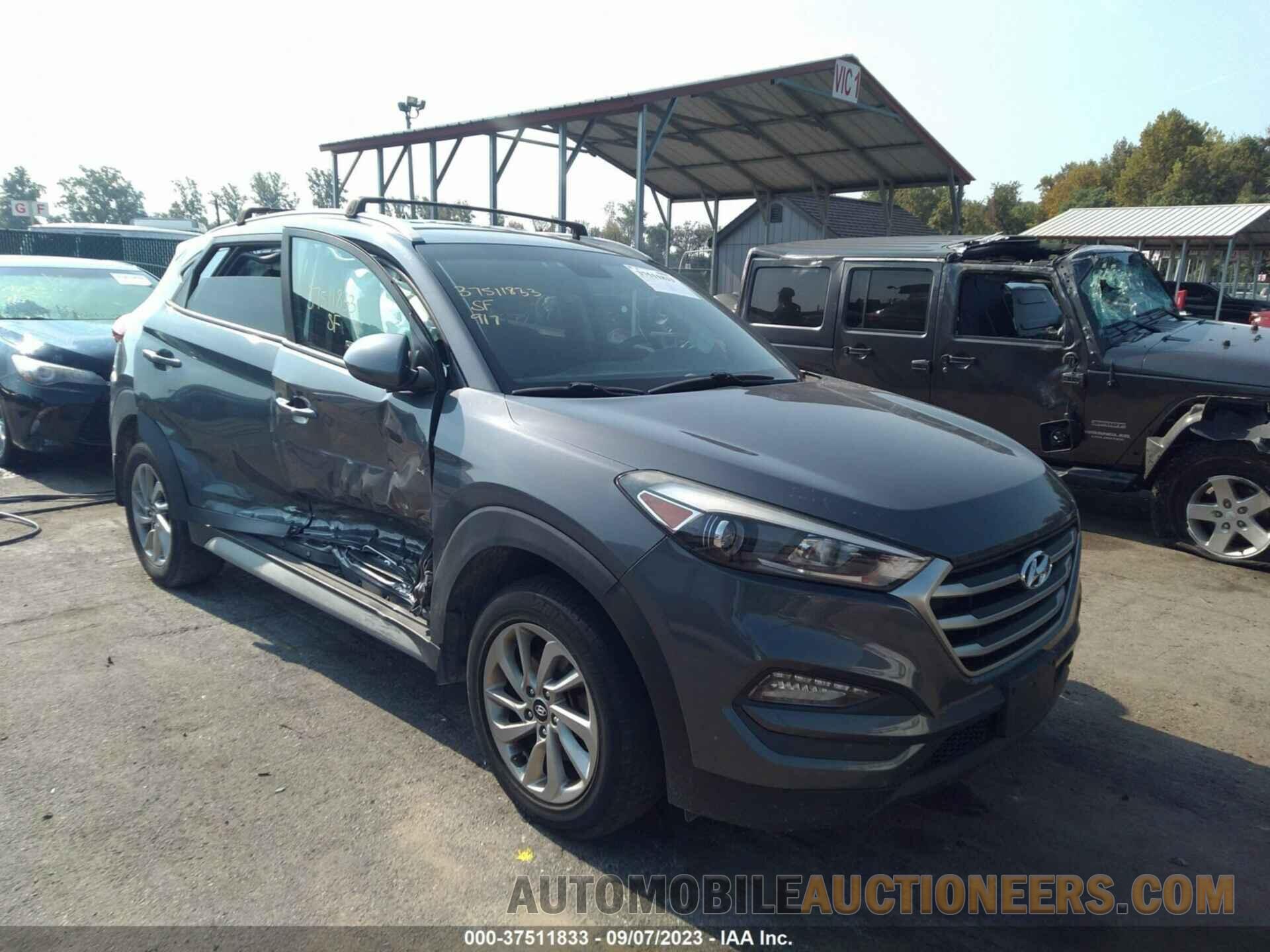 KM8J3CA48JU647489 HYUNDAI TUCSON 2018